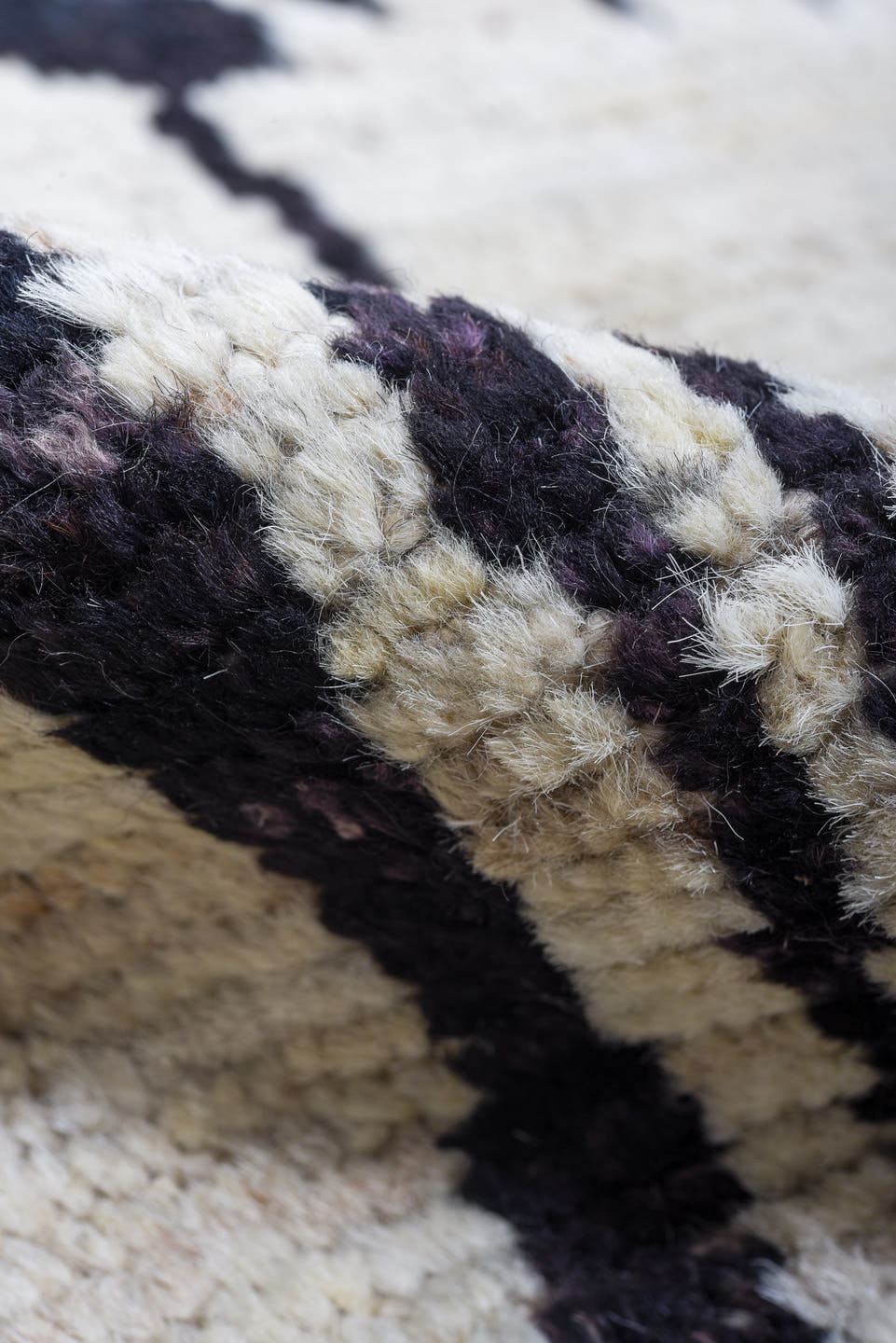 6' x 9' one-of-a-kind handmade vintage Tulu medium size rug. Color palette: ivory, charcoal, cream, taupe, gray, black