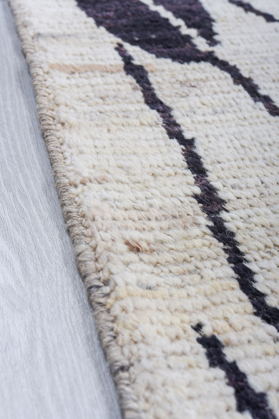 6' x 9' one-of-a-kind handmade vintage Tulu medium size rug. Color palette: ivory, charcoal, cream, taupe, gray, black