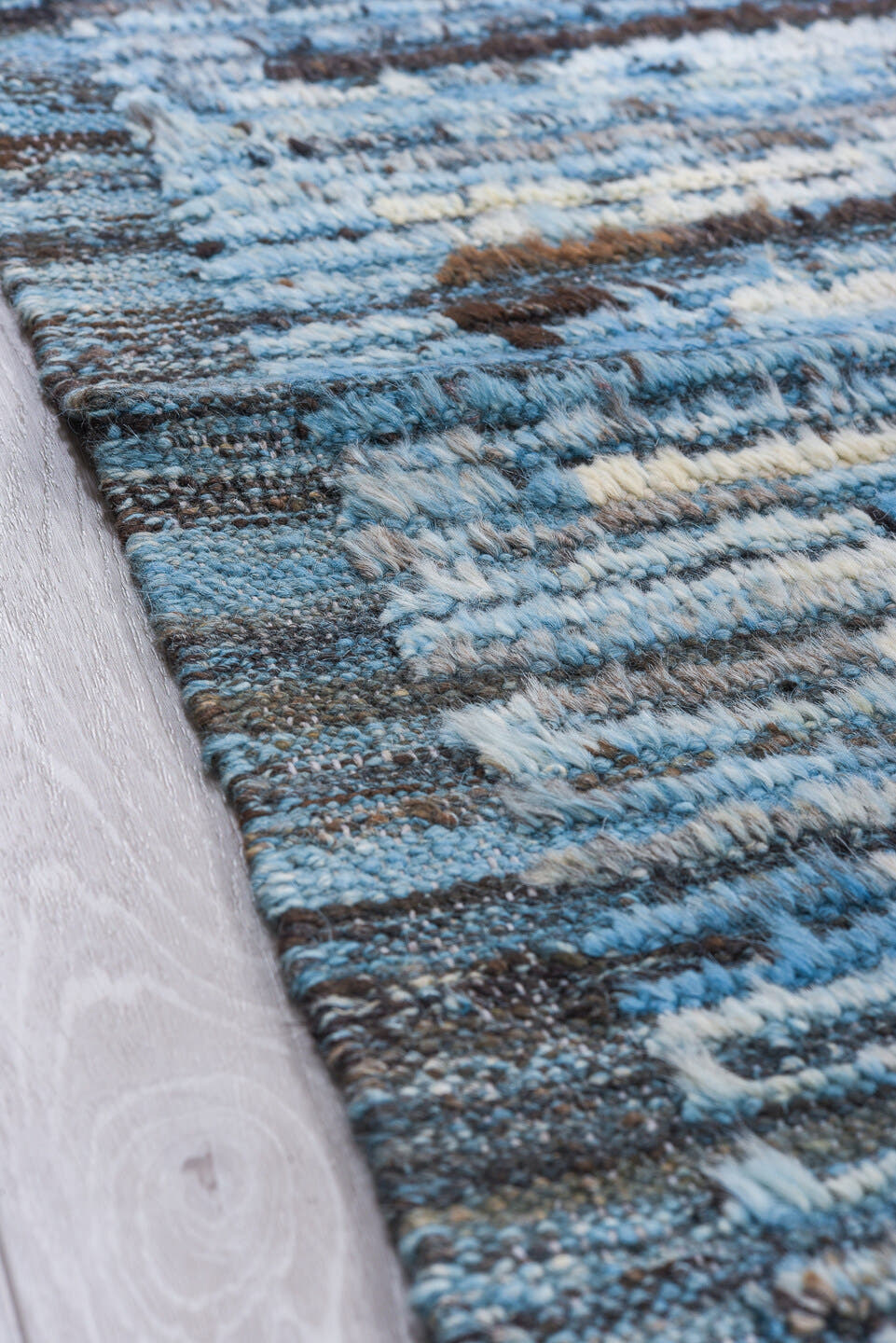 9' x 12' one-of-a-kind handmade vintage Tulu large size rug. Color palette: sky blue, ivory, charcoal, slate, steel blue