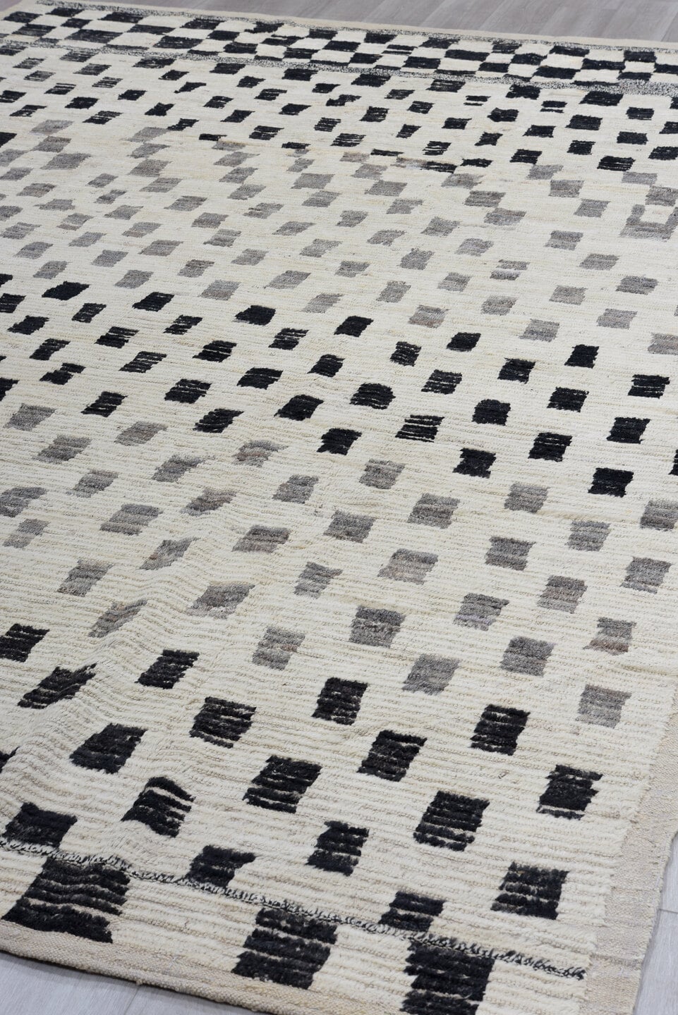 8' x 12' one-of-a-kind handmade vintage Tulu large size rug. Color palette: ivory, charcoal, gray, cream, black