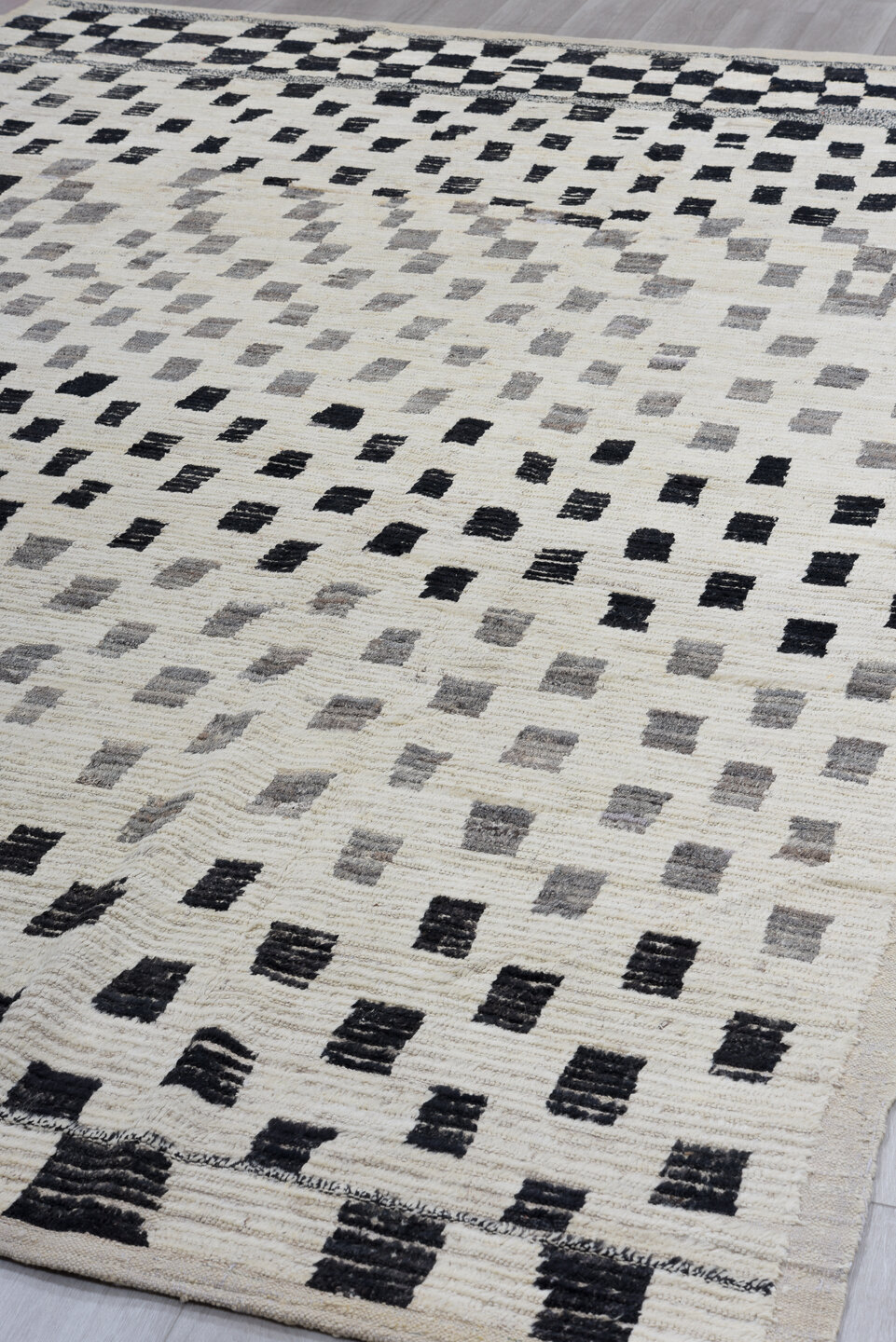 8' x 12' one-of-a-kind handmade vintage Tulu large size rug. Color palette: ivory, charcoal, gray, cream, black