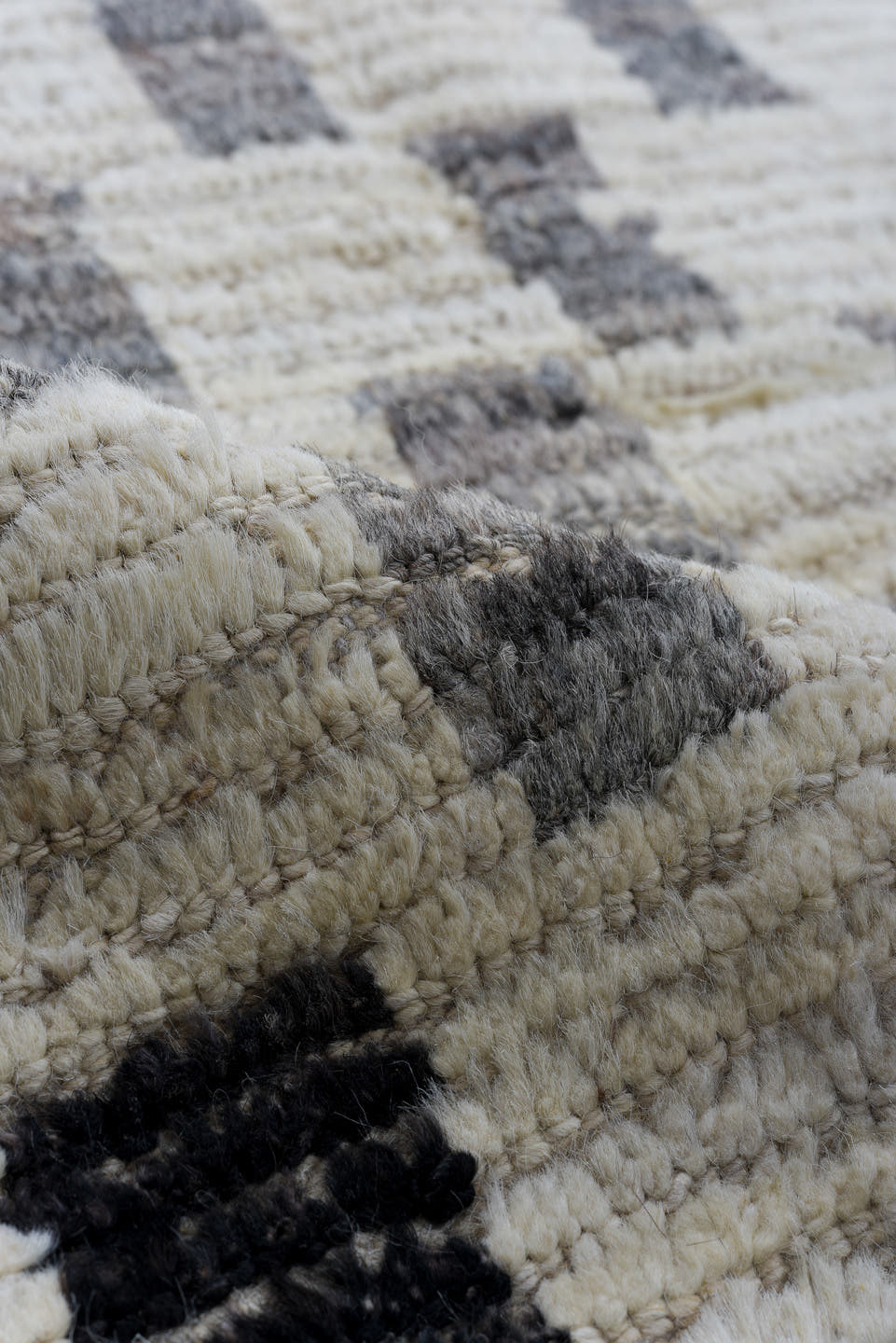 8' x 12' one-of-a-kind handmade vintage Tulu large size rug. Color palette: ivory, charcoal, gray, cream, black