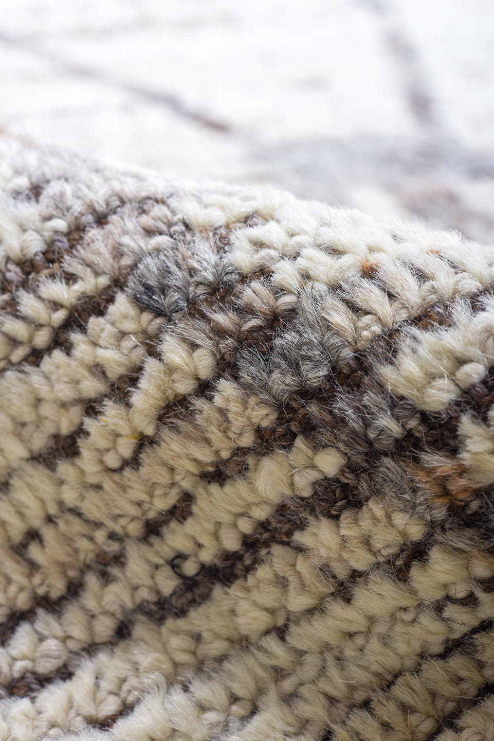 10' x 13' one-of-a-kind handmade vintage Tulu large size rug. Color palette: ivory, charcoal, taupe, brown, gray, black