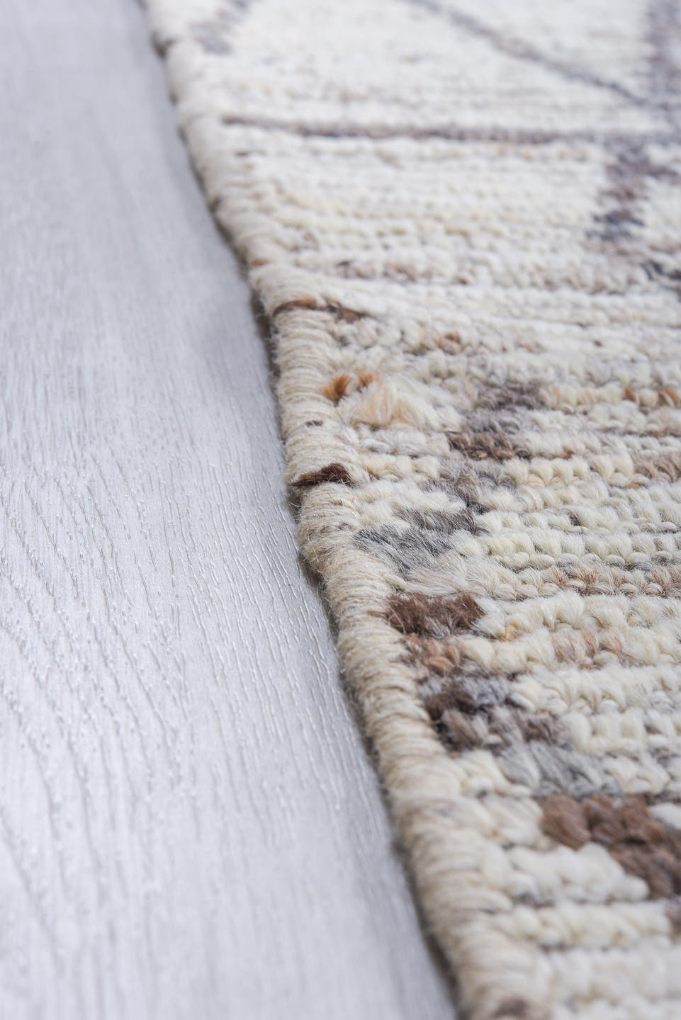10' x 13' one-of-a-kind handmade vintage Tulu large size rug. Color palette: ivory, charcoal, taupe, brown, gray, black