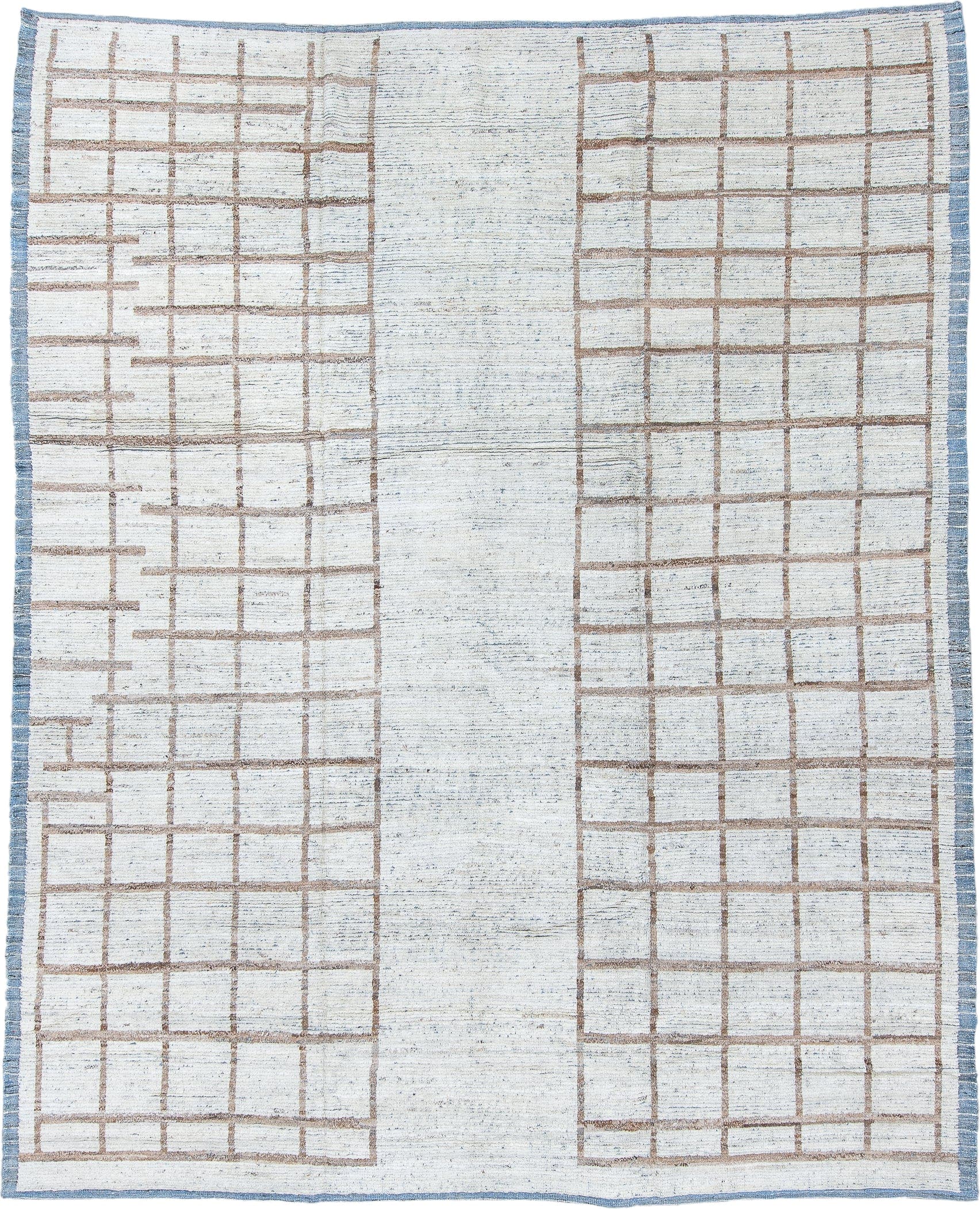 9' x 12' one-of-a-kind handmade vintage Tulu large size rug. Color palette: ivory, light blue, taupe, camel, beige, gray