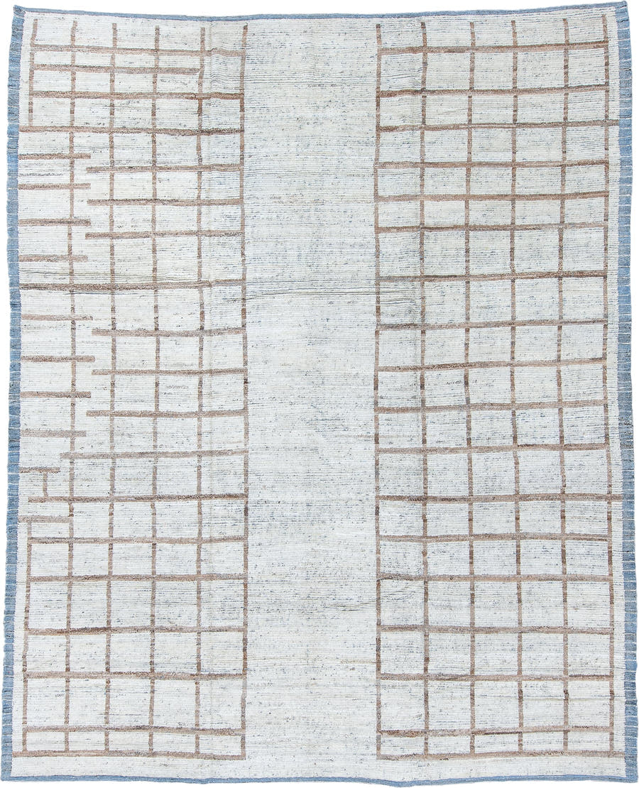 9' x 12' one-of-a-kind handmade vintage Tulu large size rug. Color palette: ivory, light blue, taupe, camel, beige, gray