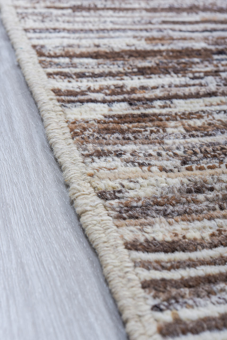 6' x 9' one-of-a-kind handmade vintage Tulu medium size rug. Color palette: ivory, taupe, brown, charcoal, cream, beige