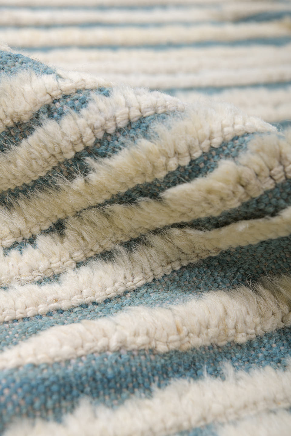 13' x 14' one-of-a-kind handmade vintage Tulu oversize rug. Color palette: ivory, sky blue, light blue