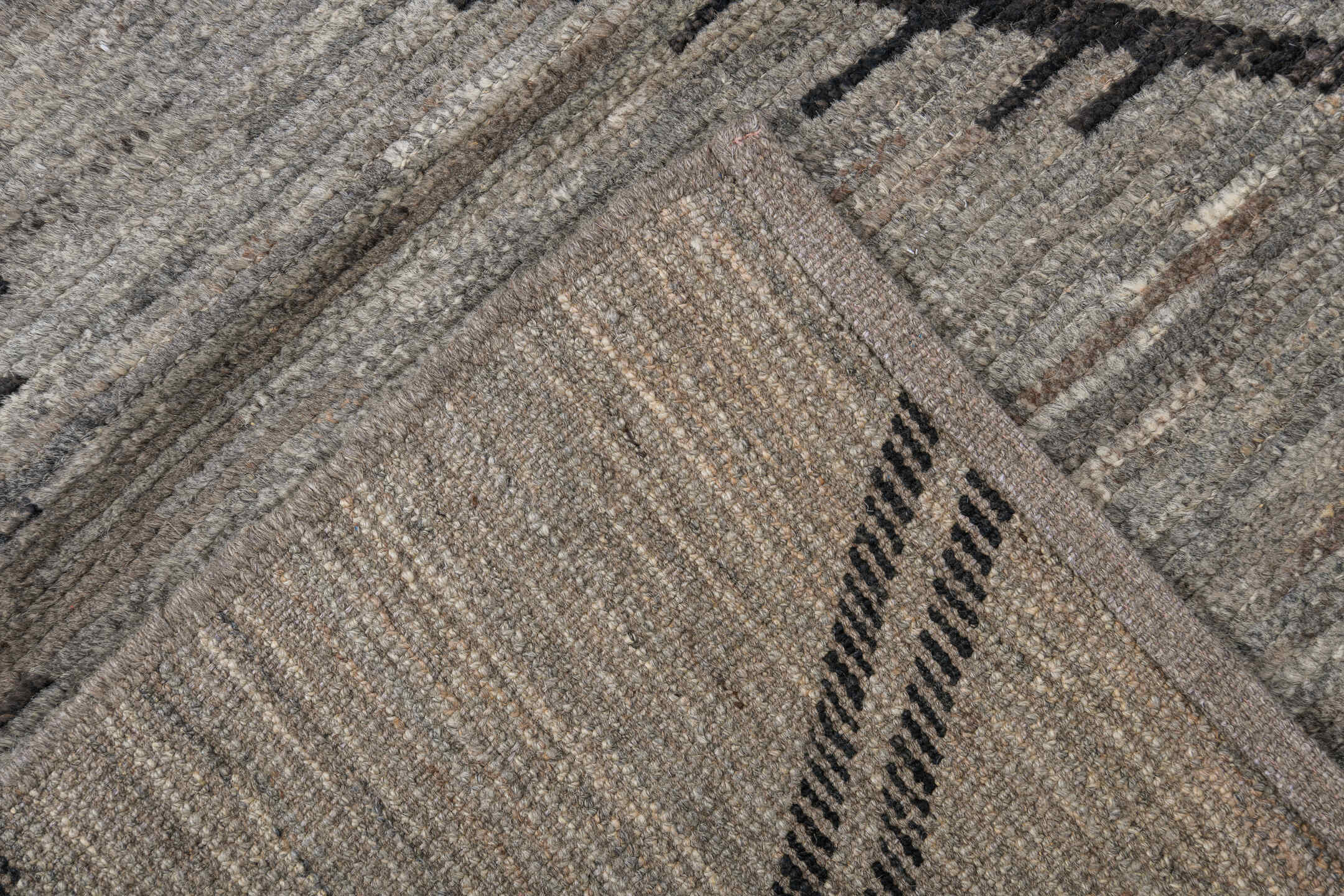 9' x 12' one-of-a-kind handmade vintage Tulu large size rug. Color palette: gray, charcoal, taupe, ivory, black, beige