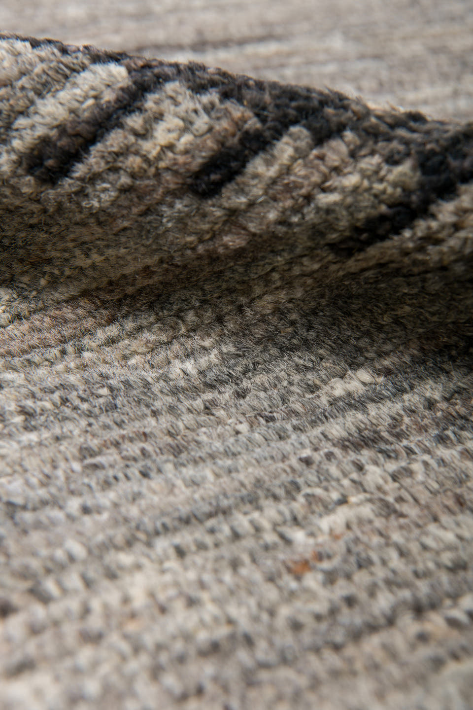 9' x 12' one-of-a-kind handmade vintage Tulu large size rug. Color palette: gray, charcoal, taupe, ivory, black, beige