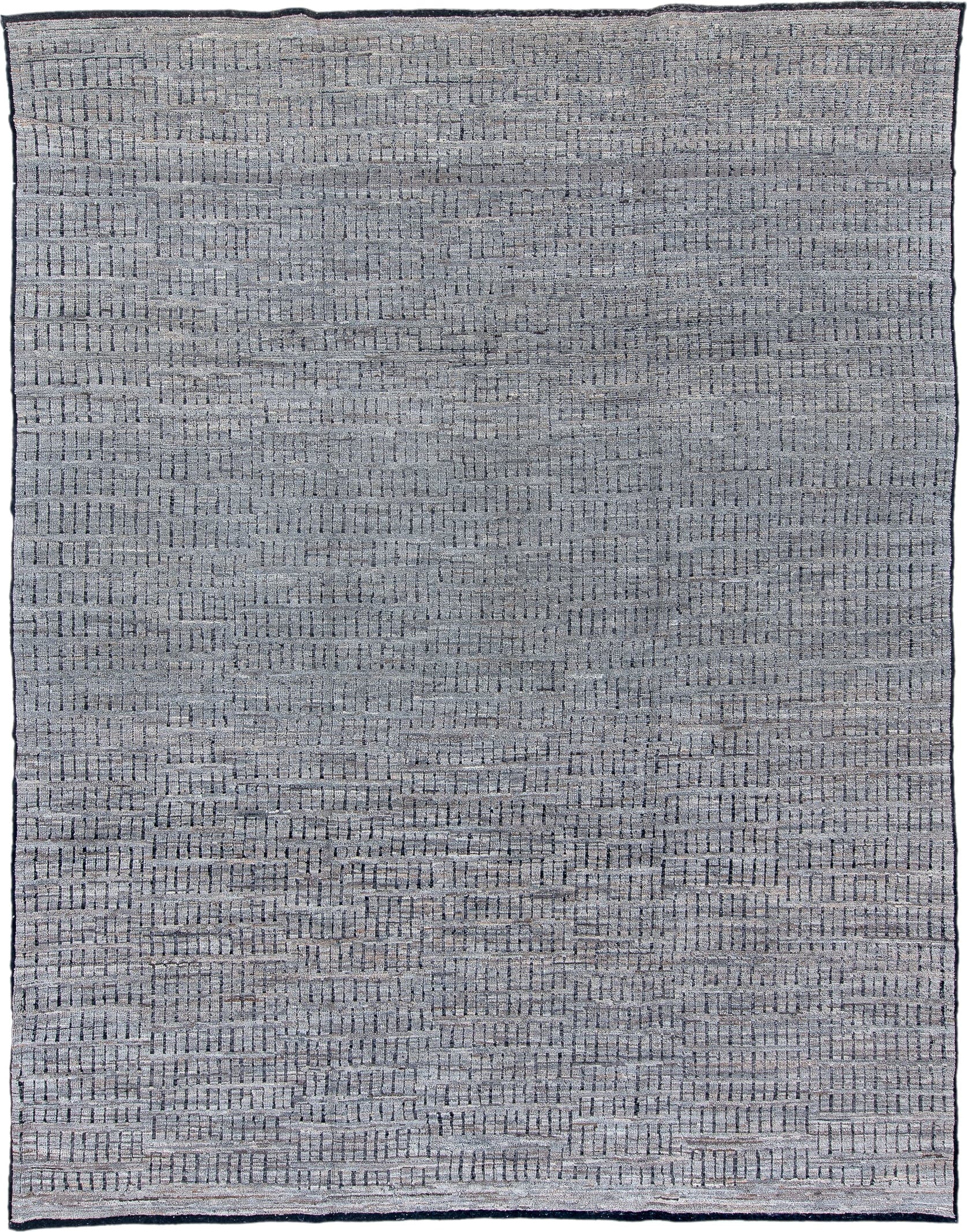 9' x 12' one-of-a-kind handmade vintage Tulu large size rug. Color palette: gray, charcoal, ivory, black