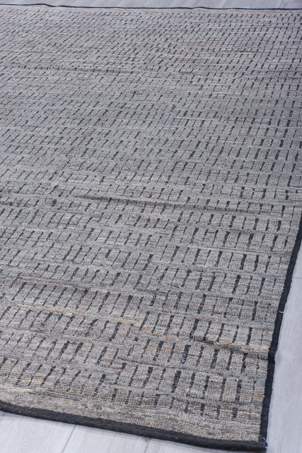 9' x 12' one-of-a-kind handmade vintage Tulu large size rug. Color palette: gray, charcoal, ivory, black