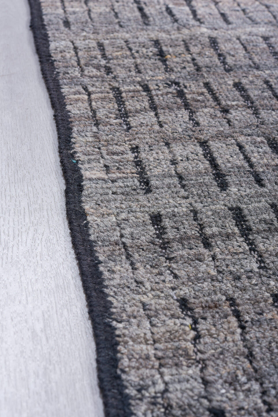 9' x 12' one-of-a-kind handmade vintage Tulu large size rug. Color palette: gray, charcoal, ivory, black