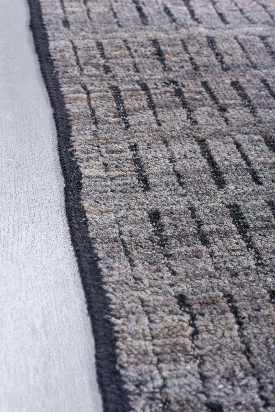9' x 12' one-of-a-kind handmade vintage Tulu large size rug. Color palette: gray, charcoal, ivory, black