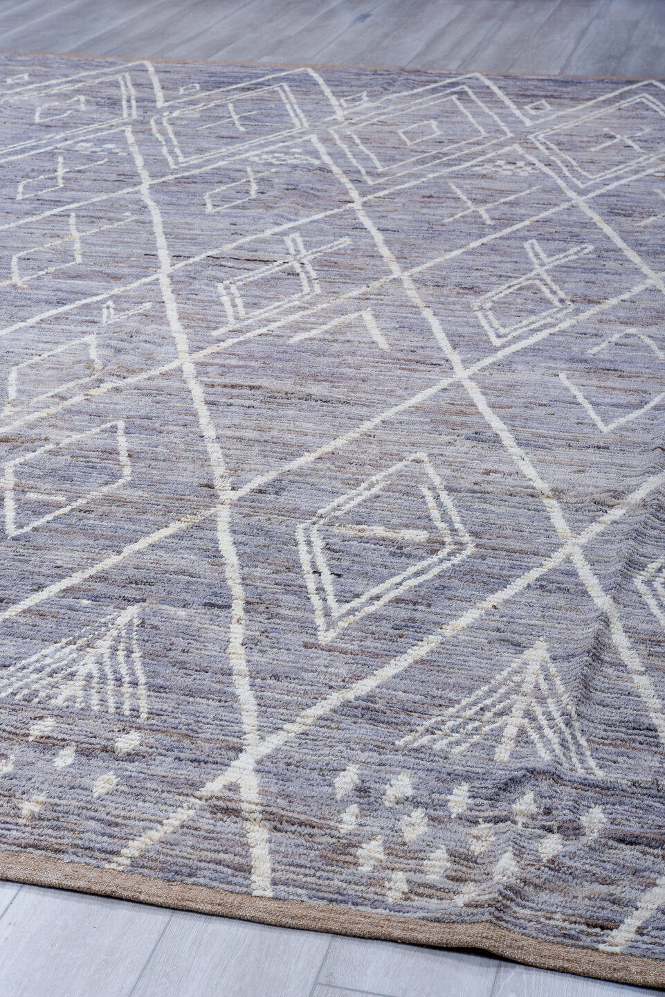 11' x 14' one-of-a-kind handmade vintage Tulu oversize rug. Color palette: lavender gray, ivory, taupe, sky blue, blush
