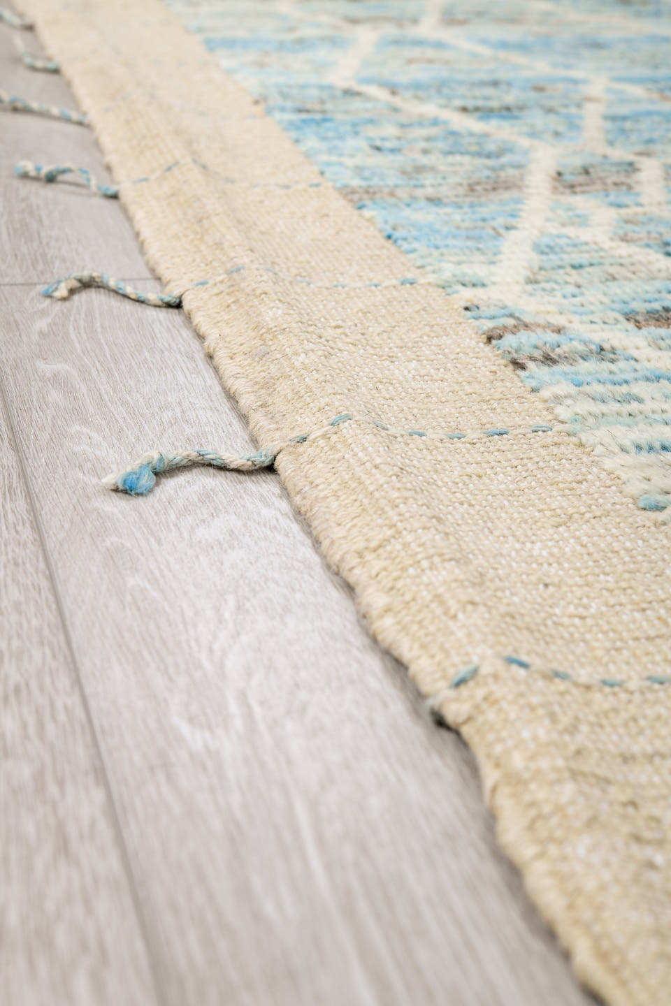 8' x 10' one-of-a-kind handmade vintage Tulu large size rug. Color palette: ivory, pale blue, light blue, silver gray, taupe