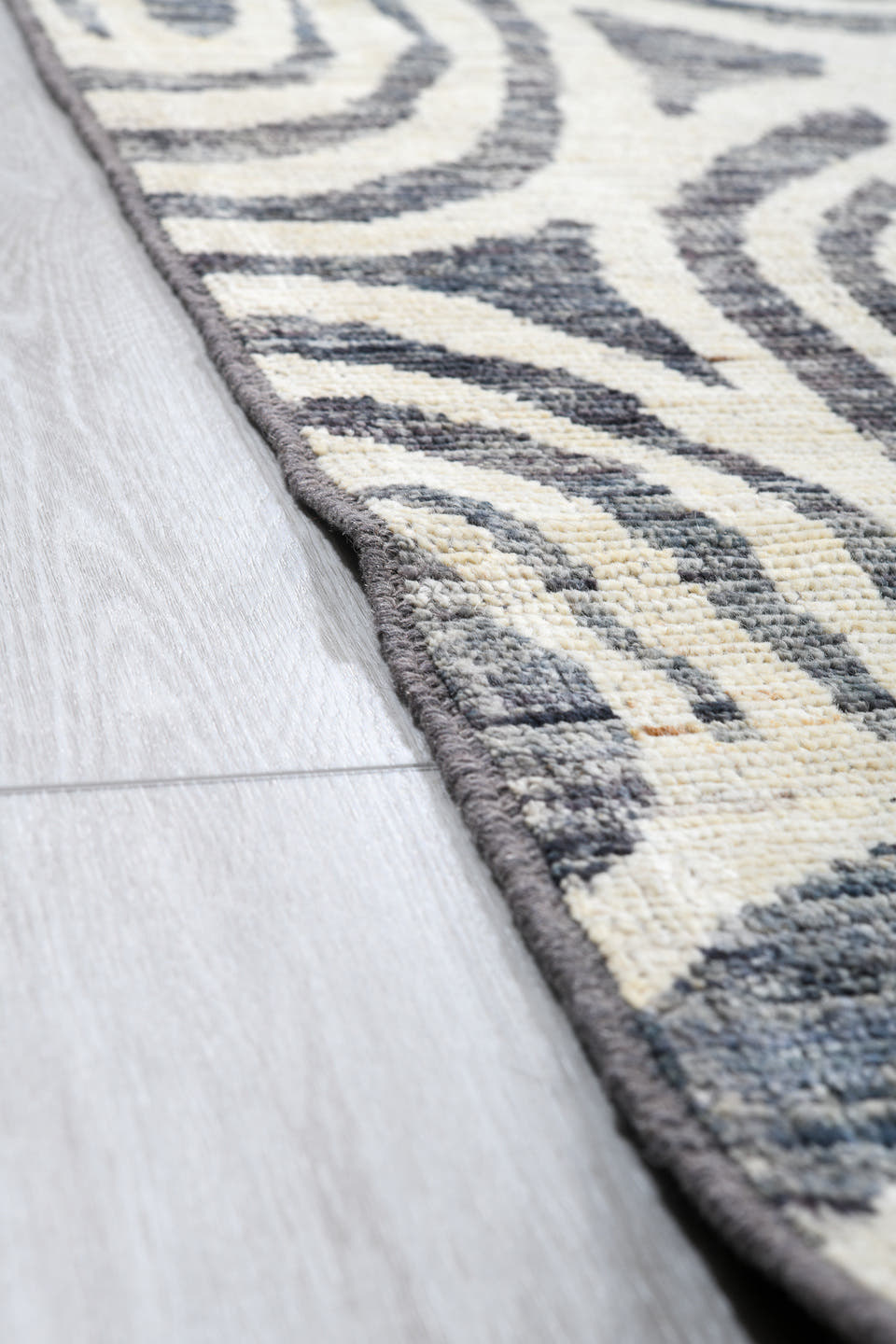 13' x 19' one-of-a-kind handmade vintage Tulu oversize rug. Color palette: ivory, slate, charcoal, gray, black