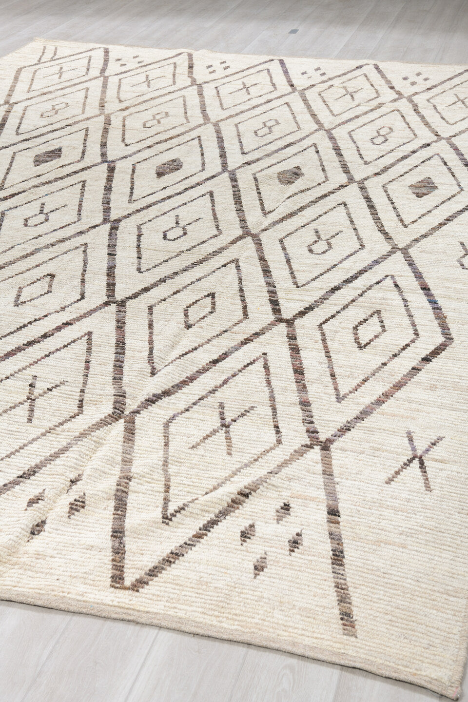 10' x 14' one-of-a-kind handmade vintage Tulu large size rug. Color palette: ivory, charcoal, taupe, brown, gray, black