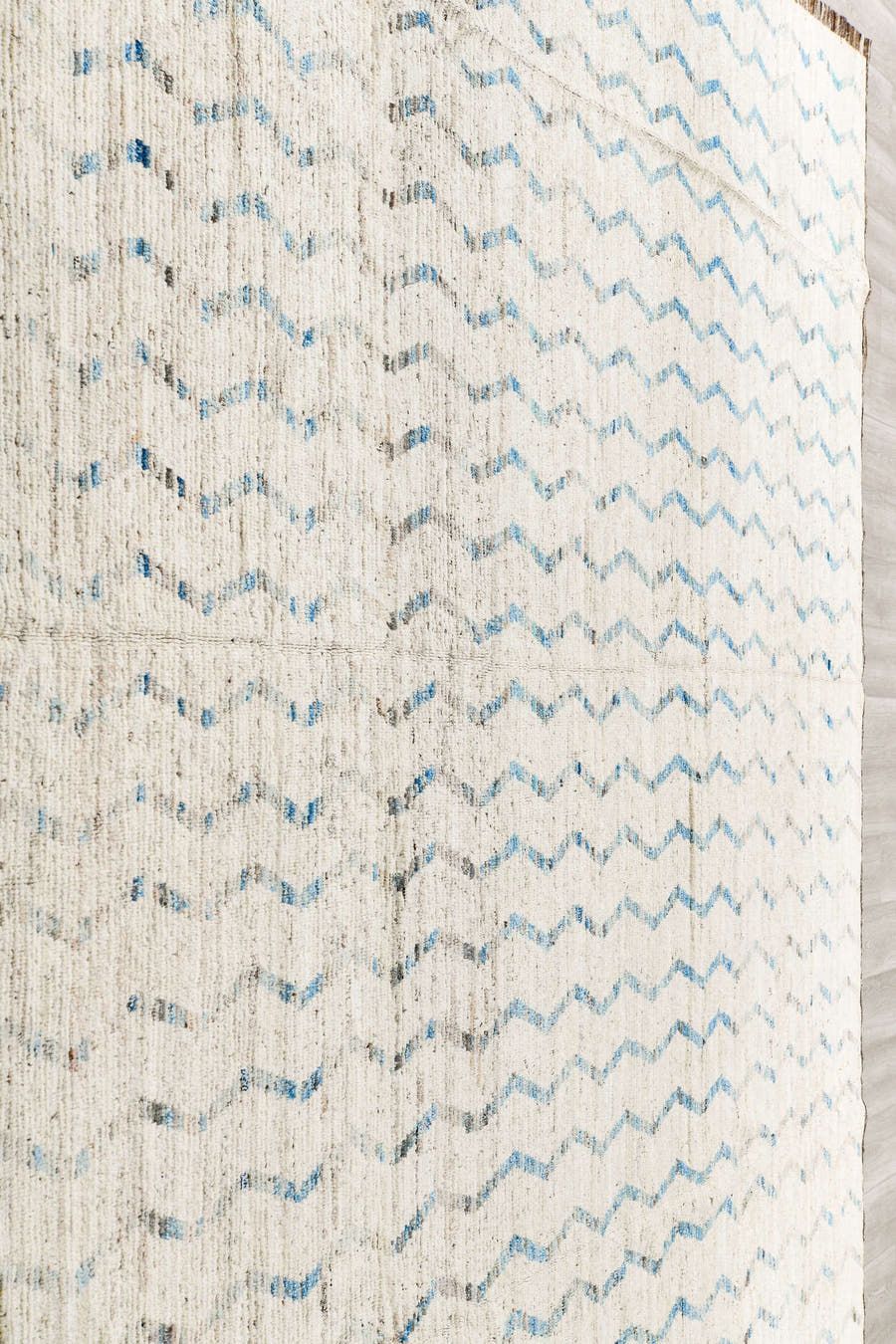 12' x 12' one-of-a-kind handmade vintage Tulu oversize rug. Color palette: ivory, pale blue, taupe, brown, light blue, beige