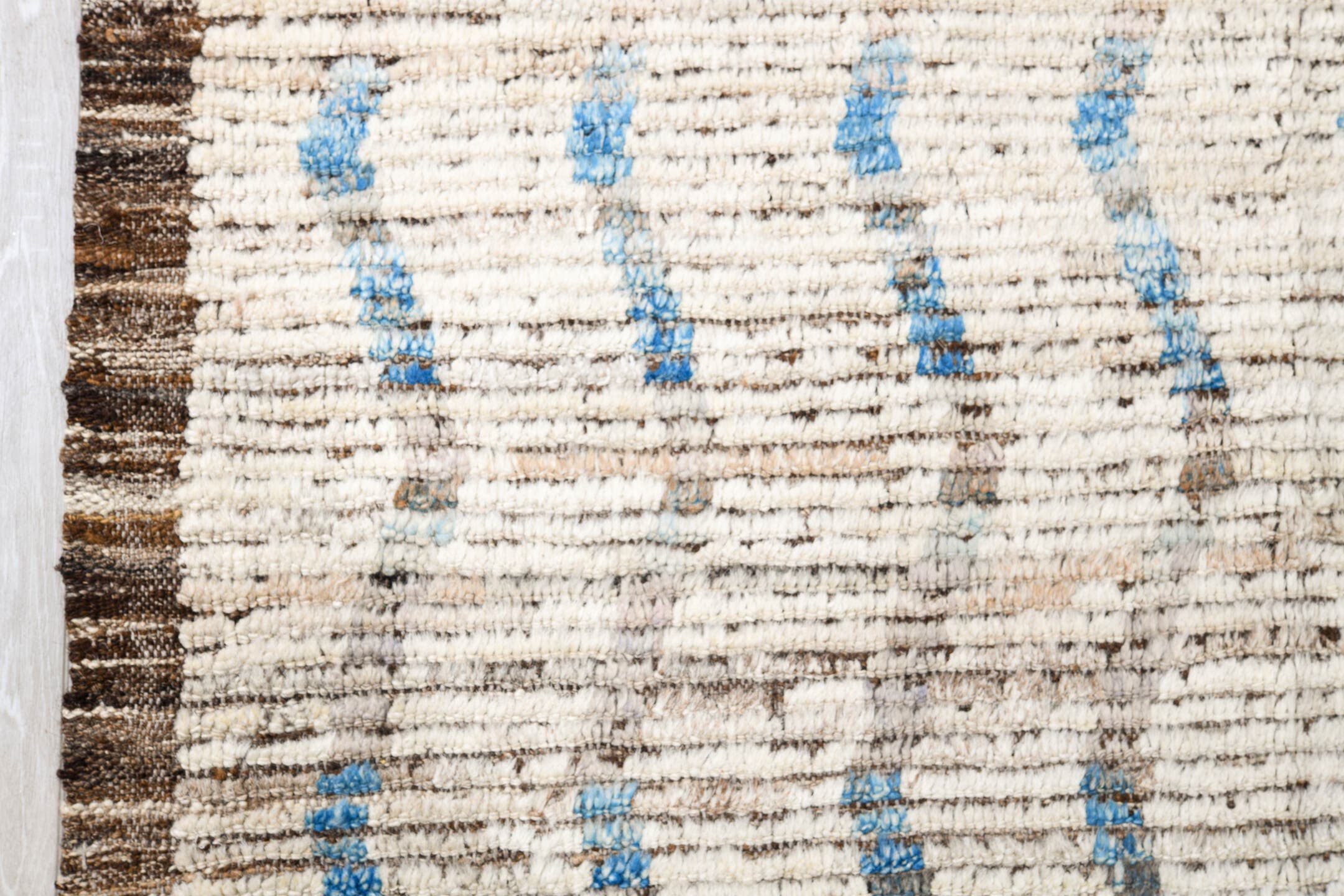 12' x 12' one-of-a-kind handmade vintage Tulu oversize rug. Color palette: ivory, pale blue, taupe, brown, light blue, beige