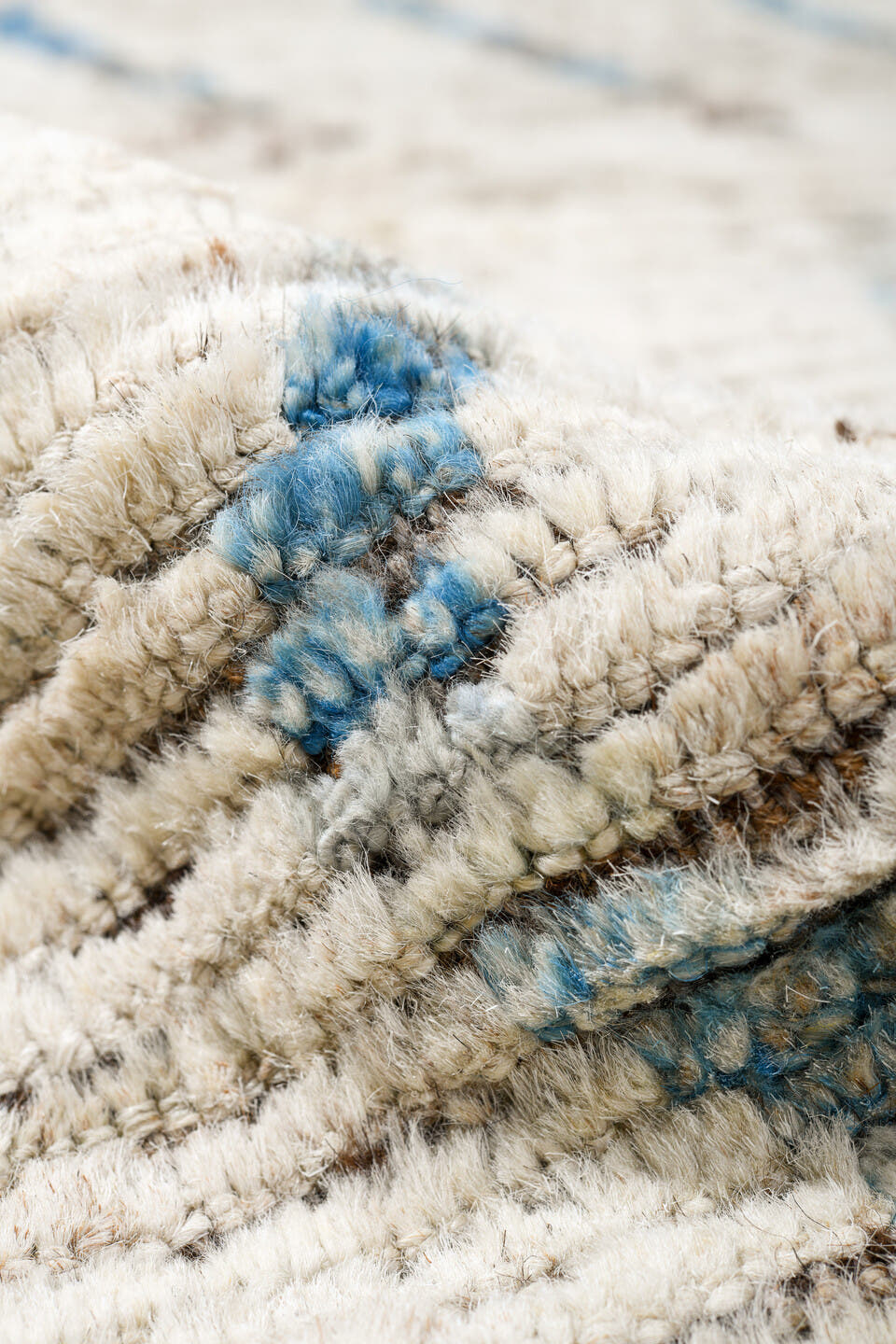 12' x 12' one-of-a-kind handmade vintage Tulu oversize rug. Color palette: ivory, pale blue, taupe, brown, light blue, beige