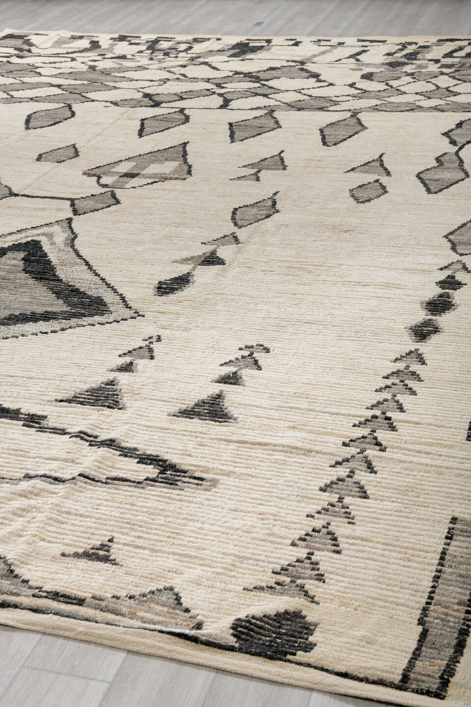 11' x 16' one-of-a-kind handmade vintage Tulu oversize rug. Color palette: ivory, charcoal, gray, cream, taupe, black, beige