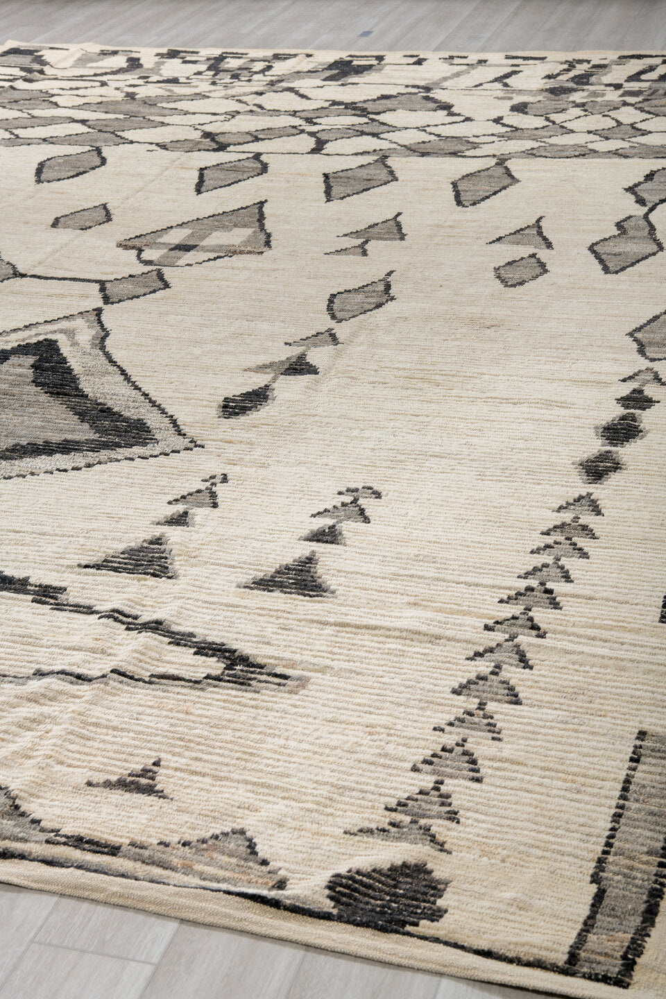 11' x 16' one-of-a-kind handmade vintage Tulu oversize rug. Color palette: ivory, charcoal, gray, cream, taupe, black, beige
