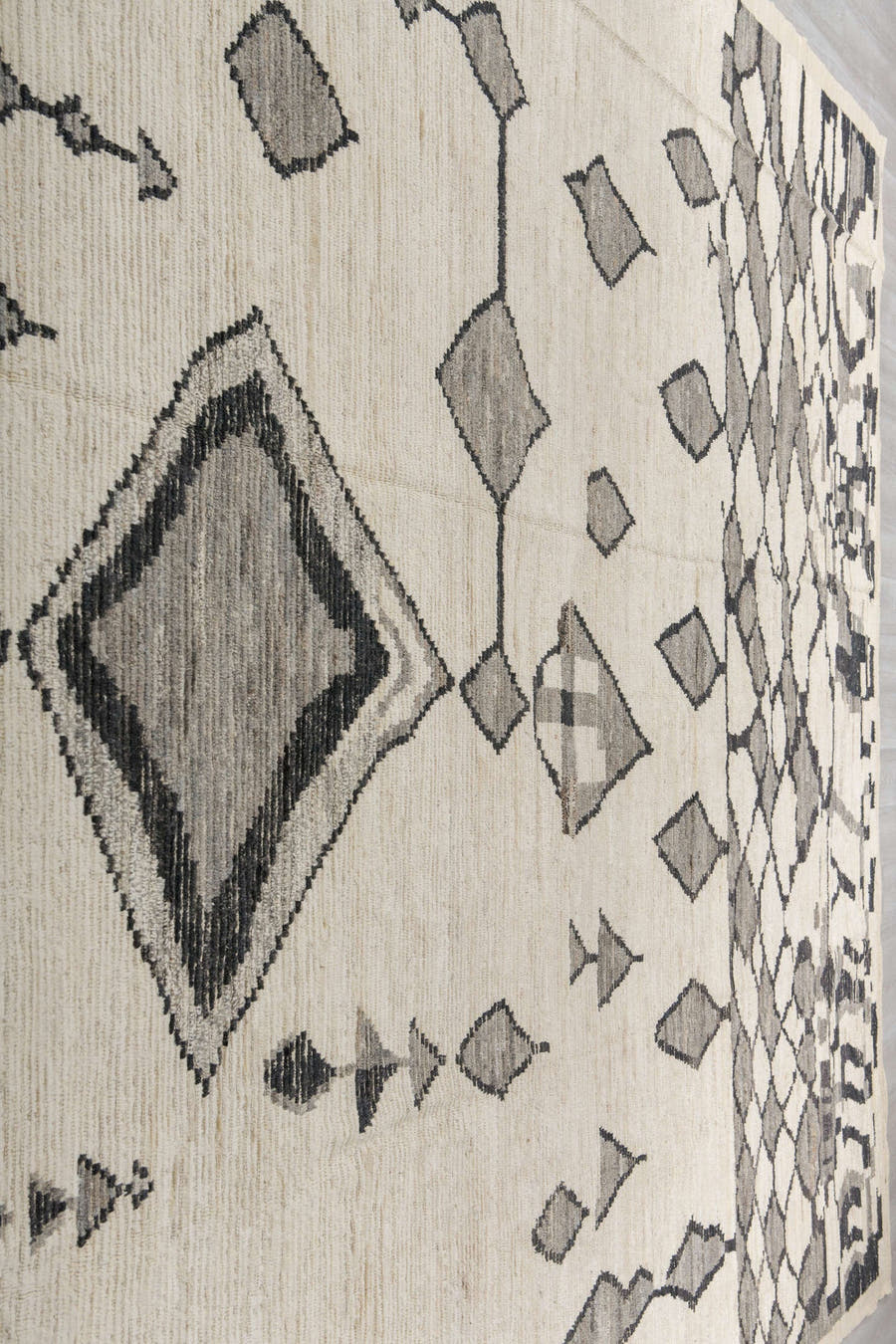 11' x 16' one-of-a-kind handmade vintage Tulu oversize rug. Color palette: ivory, charcoal, gray, cream, taupe, black, beige