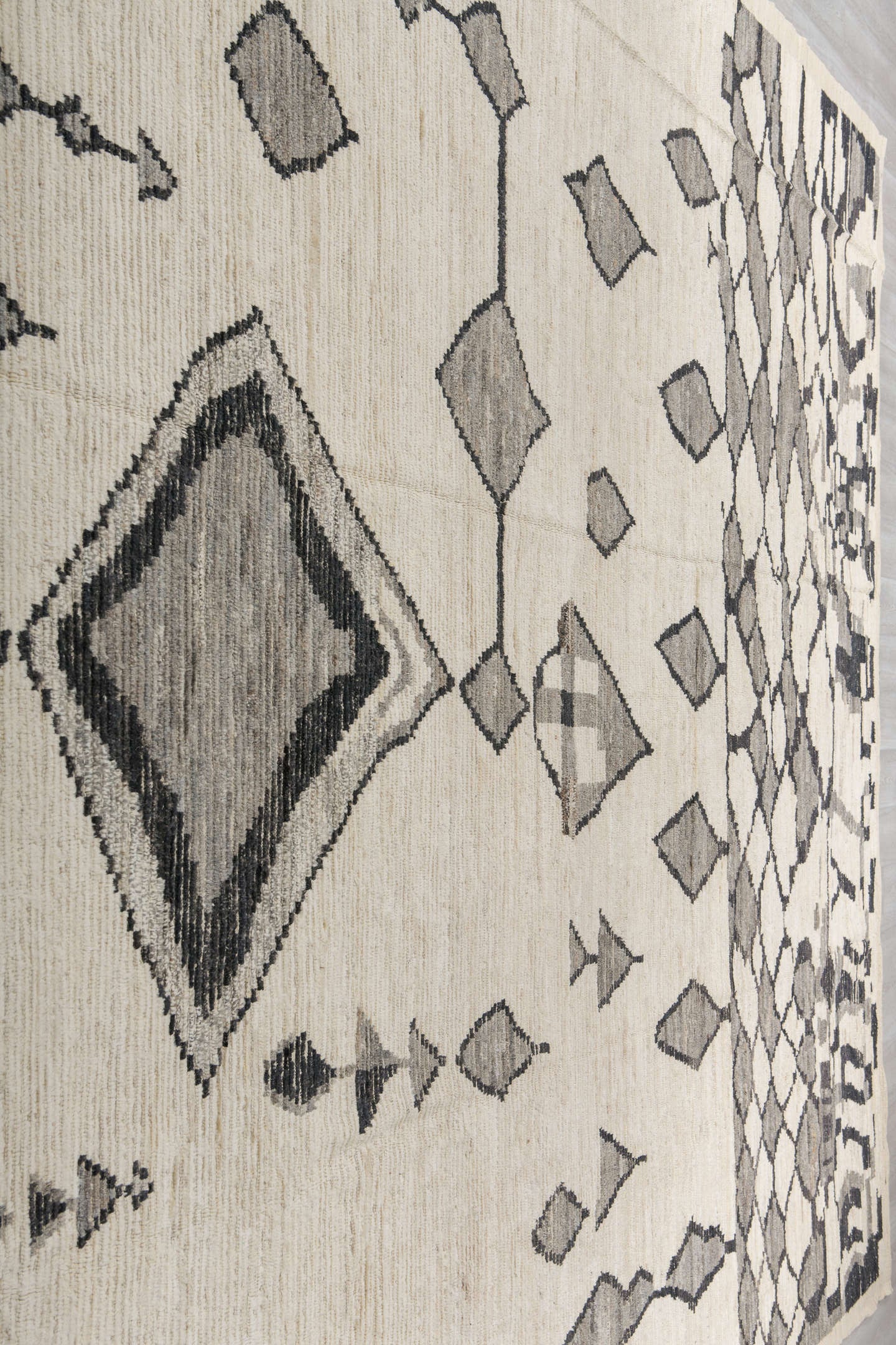 11' x 16' one-of-a-kind handmade vintage Tulu oversize rug. Color palette: ivory, charcoal, gray, cream, taupe, black, beige