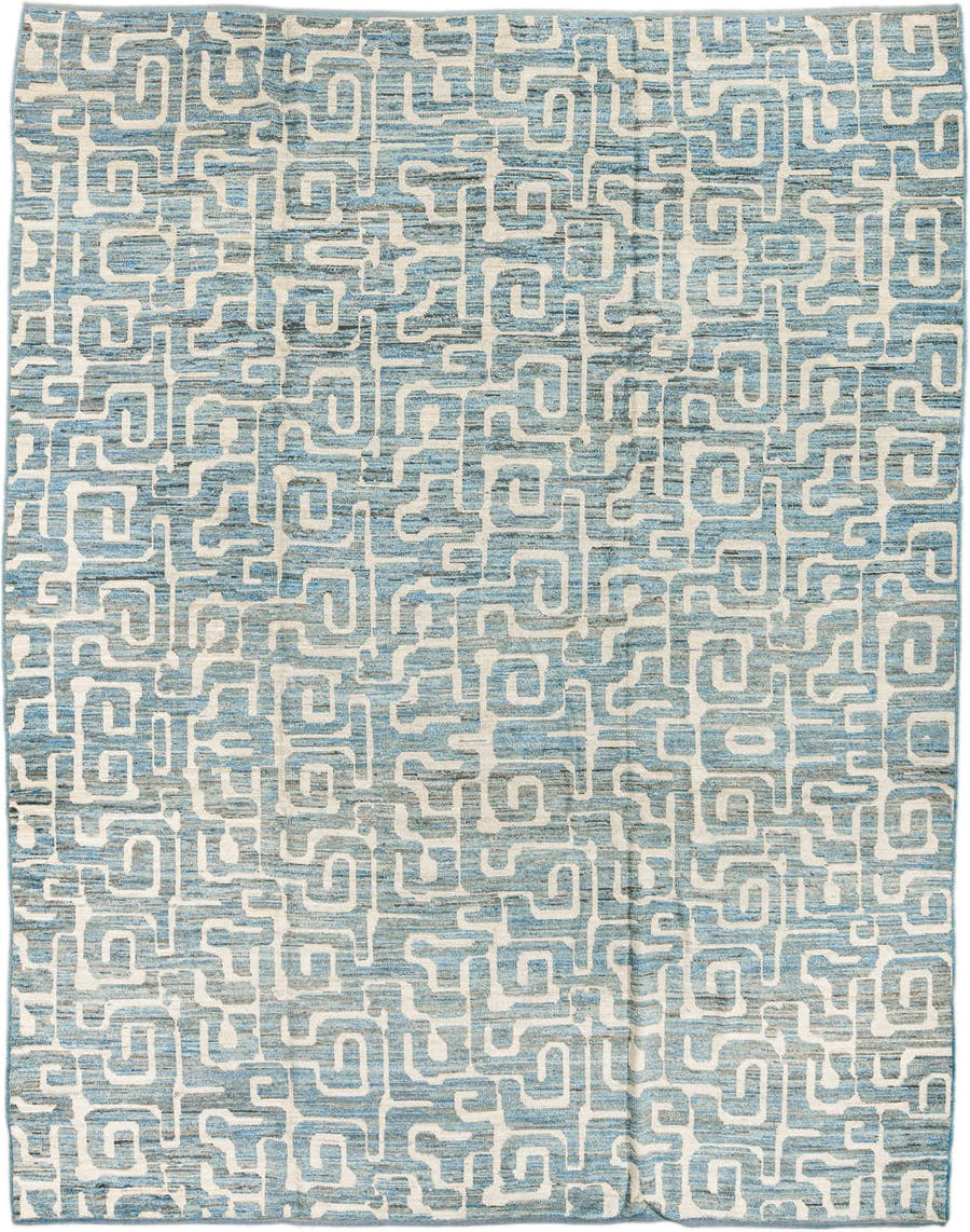 9' x 11' one-of-a-kind handmade vintage Tulu large size rug. Color palette: ivory, sky blue, pale blue, cream, light blue