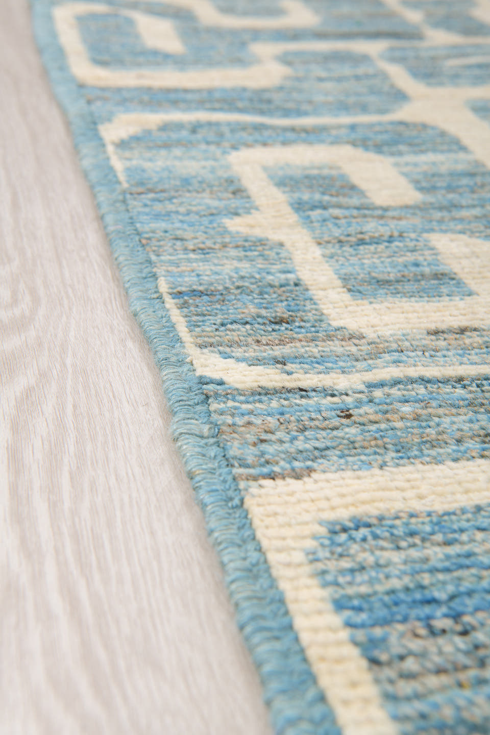 9' x 11' one-of-a-kind handmade vintage Tulu large size rug. Color palette: ivory, sky blue, pale blue, cream, light blue