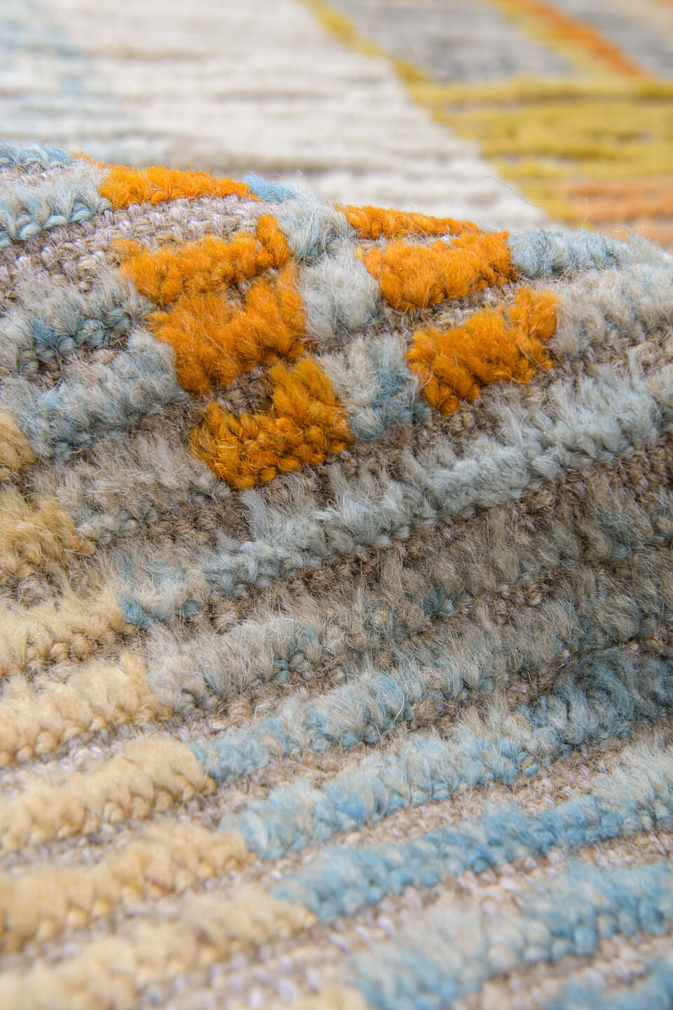 10' x 13' one-of-a-kind handmade vintage Tulu oversize rug. Color palette: ivory, rust, saffron, charcoal, pale blue, sage