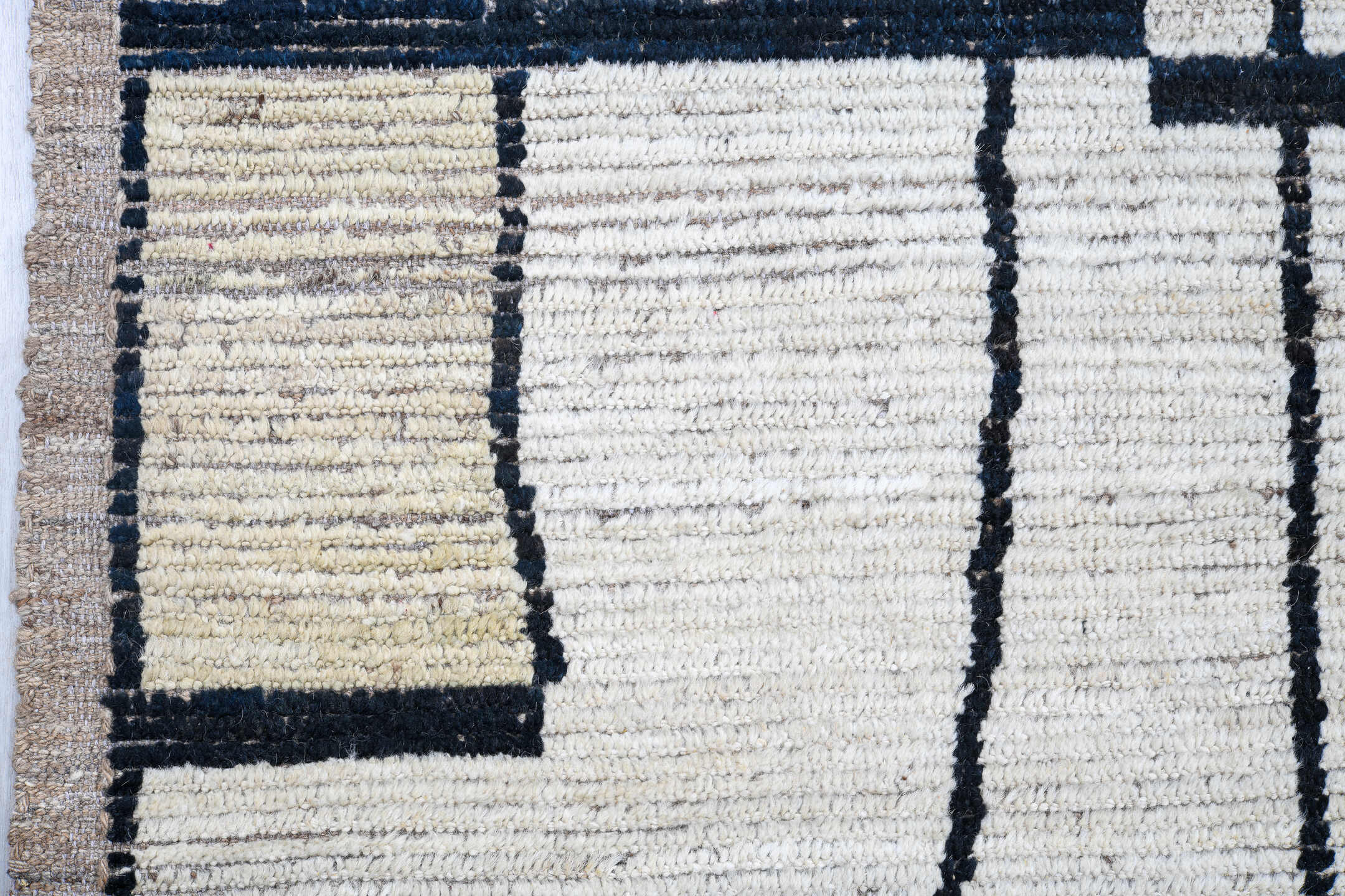 9' x 11' one-of-a-kind handmade vintage Tulu large size rug. Color palette: ivory, cream, charcoal, taupe, beige, black