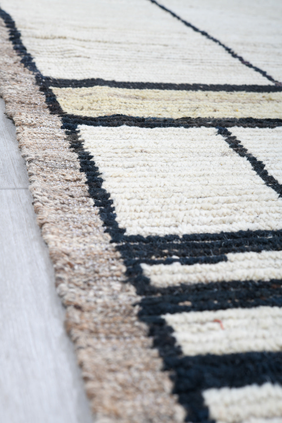9' x 11' one-of-a-kind handmade vintage Tulu large size rug. Color palette: ivory, cream, charcoal, taupe, beige, black