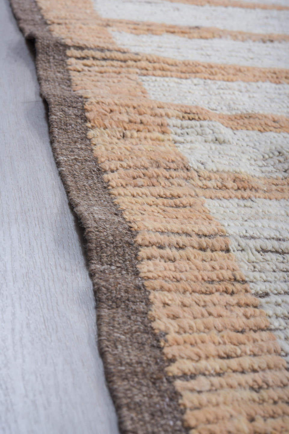 9' x 12' one-of-a-kind handmade vintage Tulu large size rug. Color palette: camel, ivory, crimson, taupe, brown, beige, red