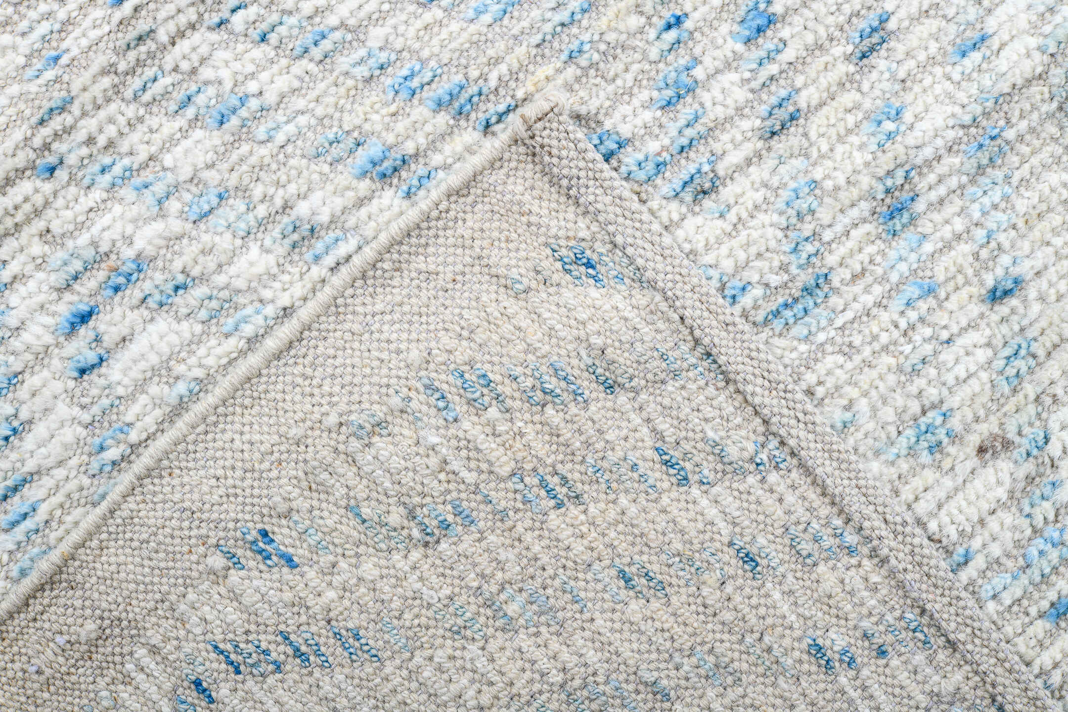13' x 16' one-of-a-kind handmade vintage Tulu oversize rug. Color palette: ivory, pale blue, cream, taupe, light gray