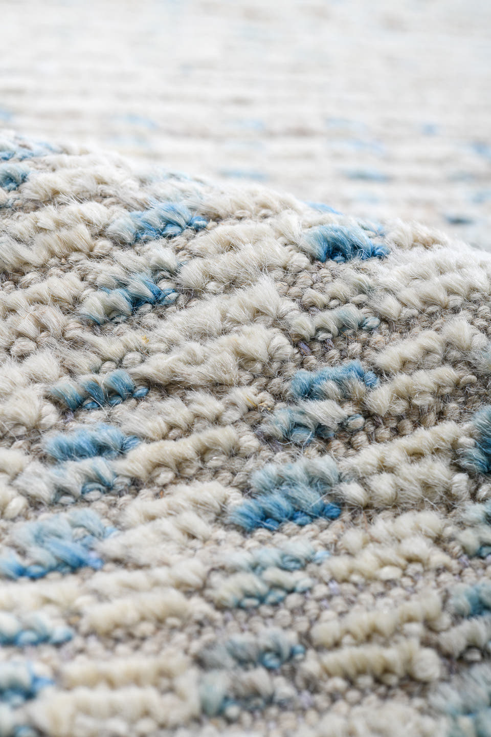 13' x 16' one-of-a-kind handmade vintage Tulu oversize rug. Color palette: ivory, pale blue, cream, taupe, light gray
