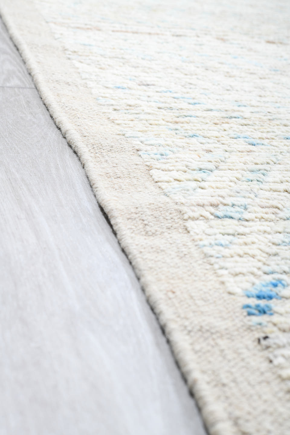 13' x 16' one-of-a-kind handmade vintage Tulu oversize rug. Color palette: ivory, pale blue, cream, taupe, light gray