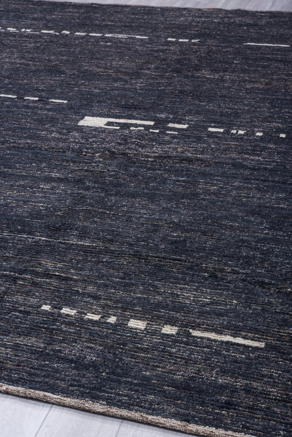 10' x 14' one-of-a-kind handmade vintage Tulu oversize rug. Color palette: charcoal, ivory, slate, taupe, ebony, black, gray