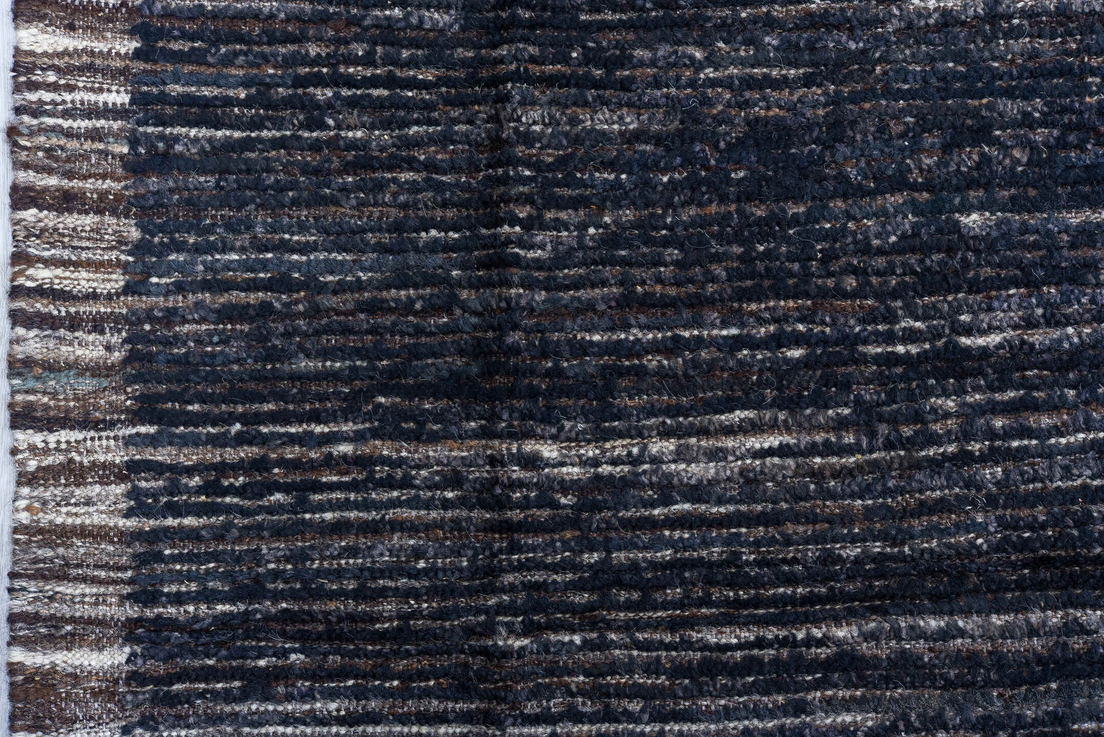 10' x 14' one-of-a-kind handmade vintage Tulu oversize rug. Color palette: charcoal, ivory, slate, taupe, ebony, black, gray