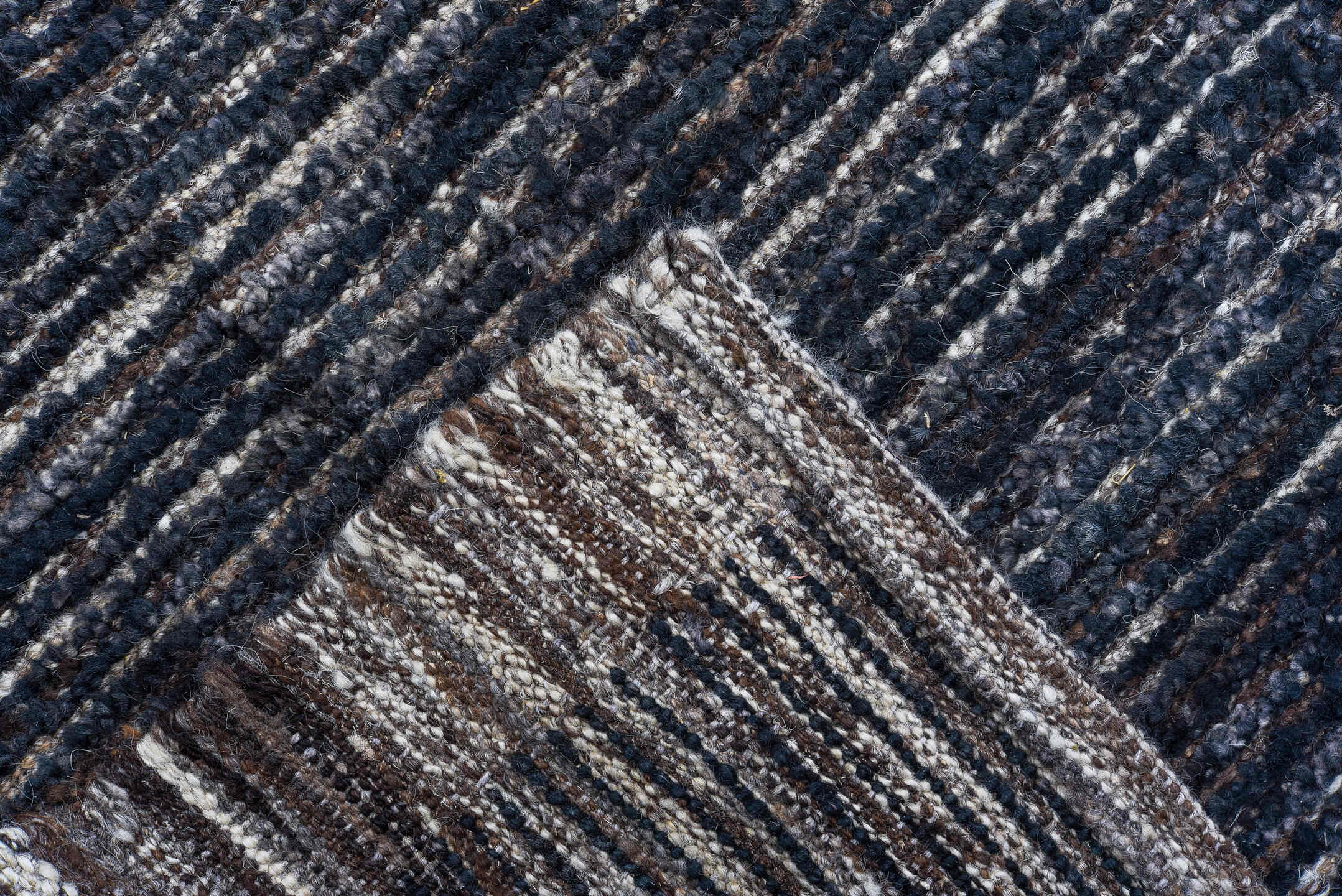 10' x 14' one-of-a-kind handmade vintage Tulu oversize rug. Color palette: charcoal, ivory, slate, taupe, ebony, black, gray