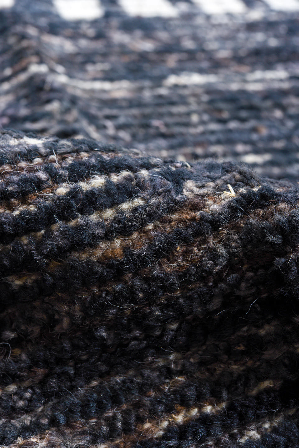 10' x 14' one-of-a-kind handmade vintage Tulu oversize rug. Color palette: charcoal, ivory, slate, taupe, ebony, black, gray