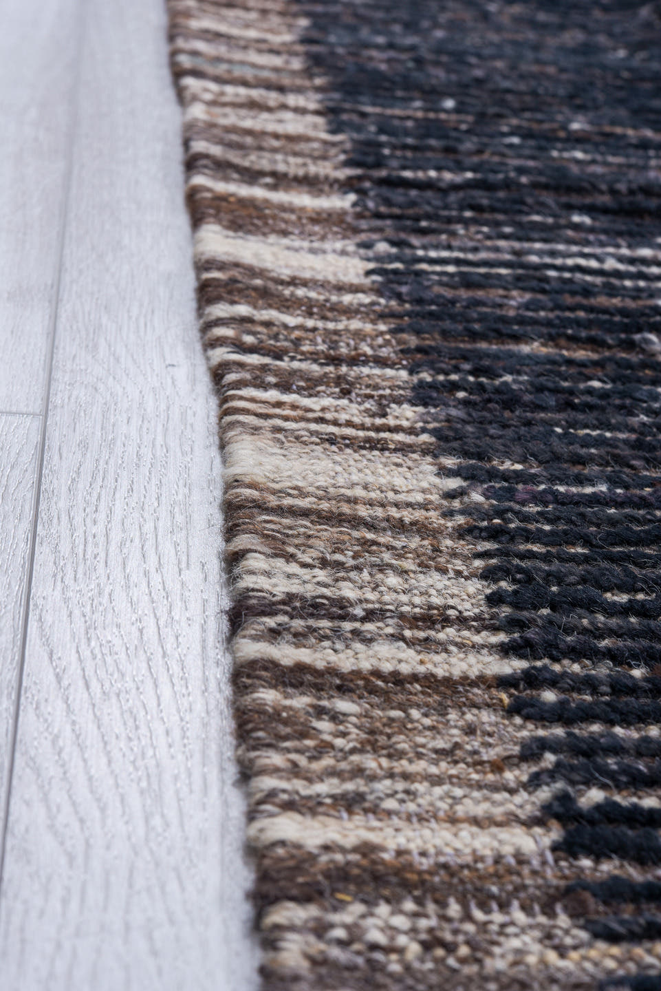 10' x 14' one-of-a-kind handmade vintage Tulu oversize rug. Color palette: charcoal, ivory, slate, taupe, ebony, black, gray