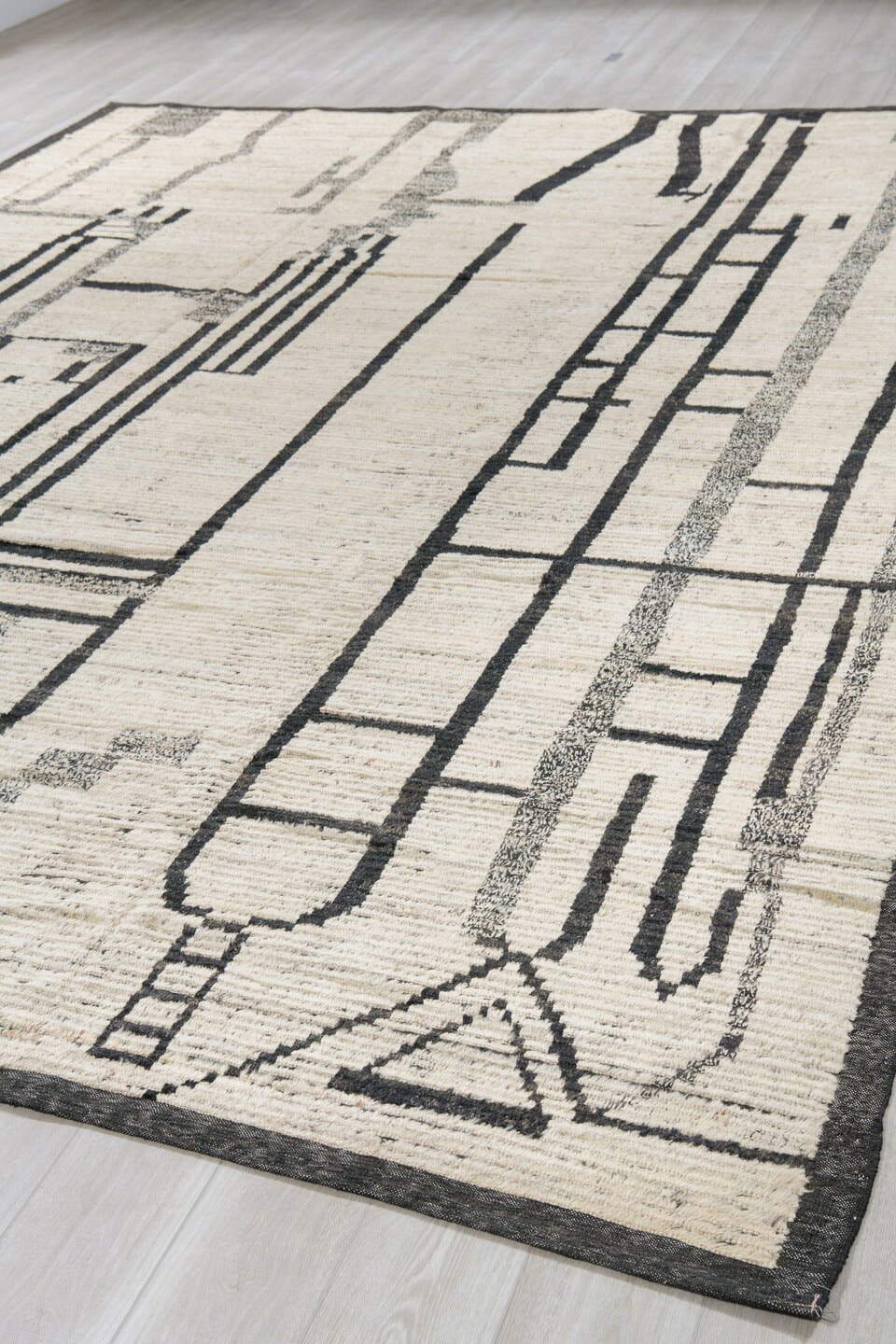 10' x 13' one-of-a-kind handmade vintage Tulu large size rug. Color palette: ivory, charcoal, gray, black