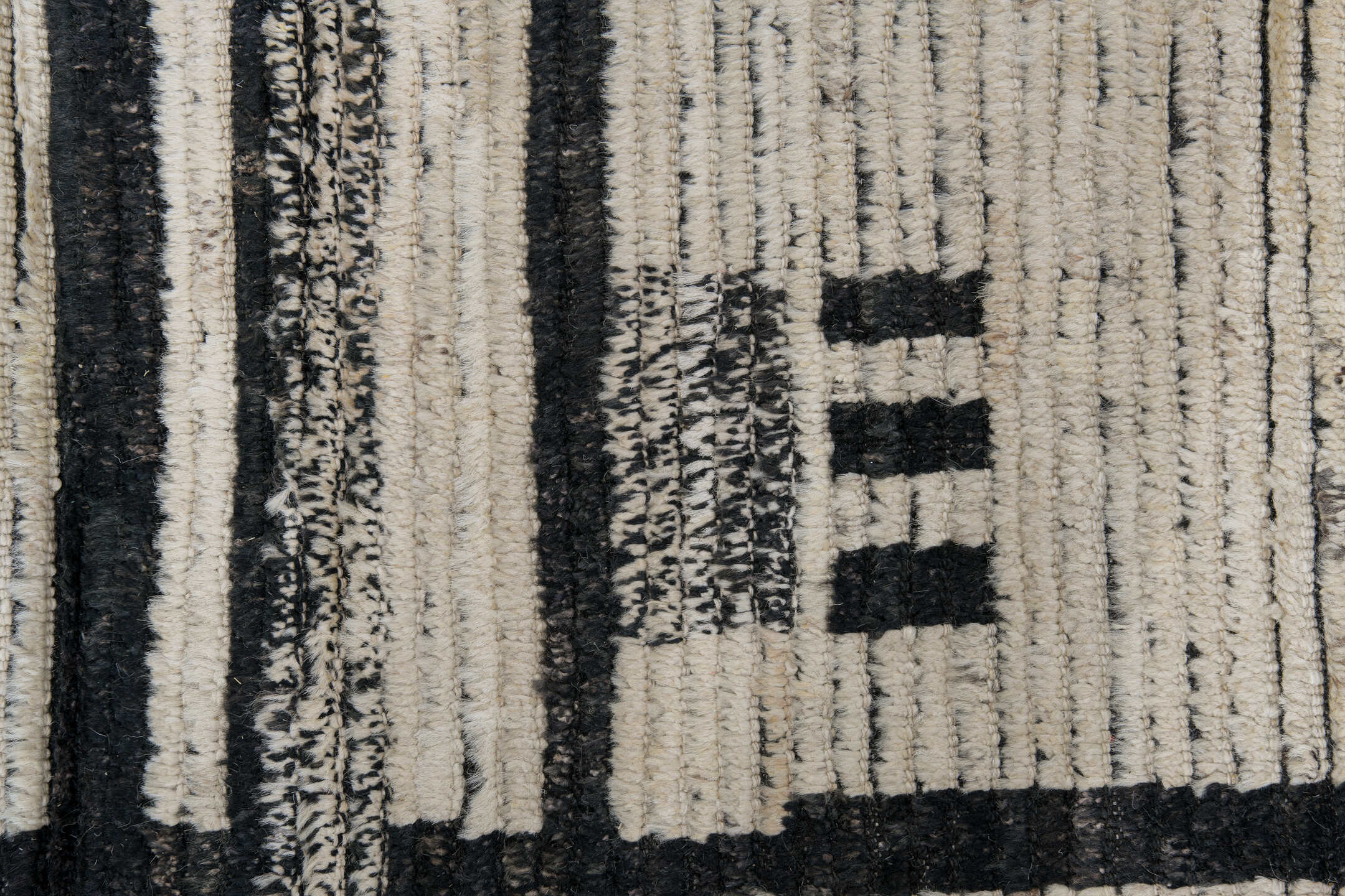10' x 13' one-of-a-kind handmade vintage Tulu large size rug. Color palette: ivory, charcoal, gray, black