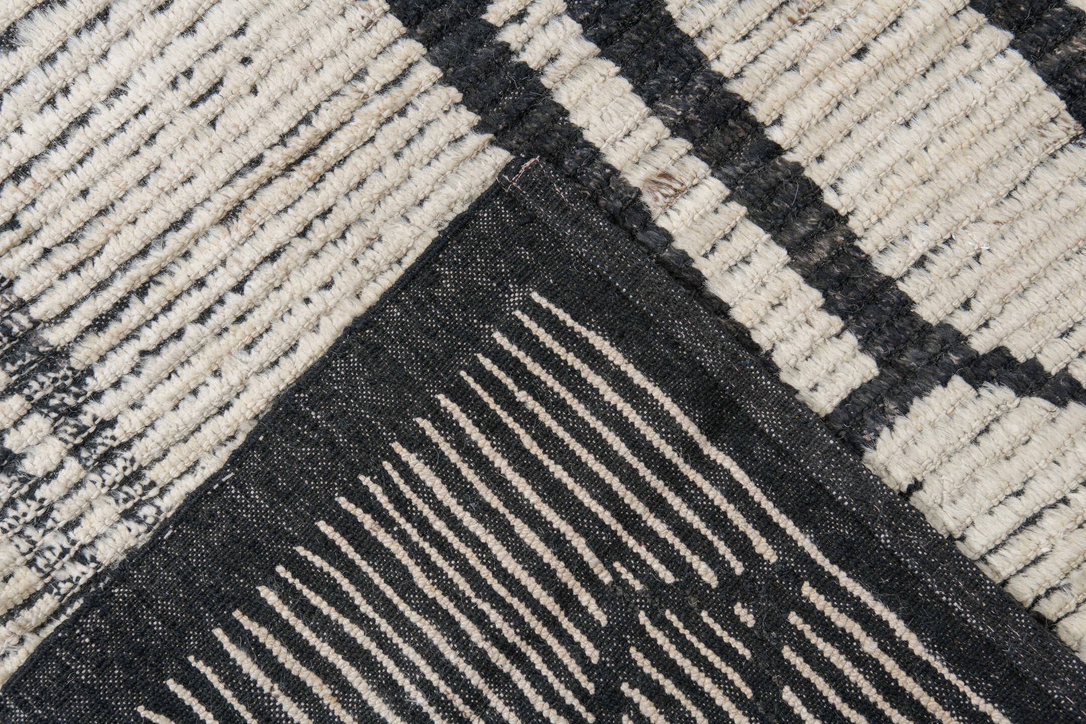 10' x 13' one-of-a-kind handmade vintage Tulu large size rug. Color palette: ivory, charcoal, gray, black