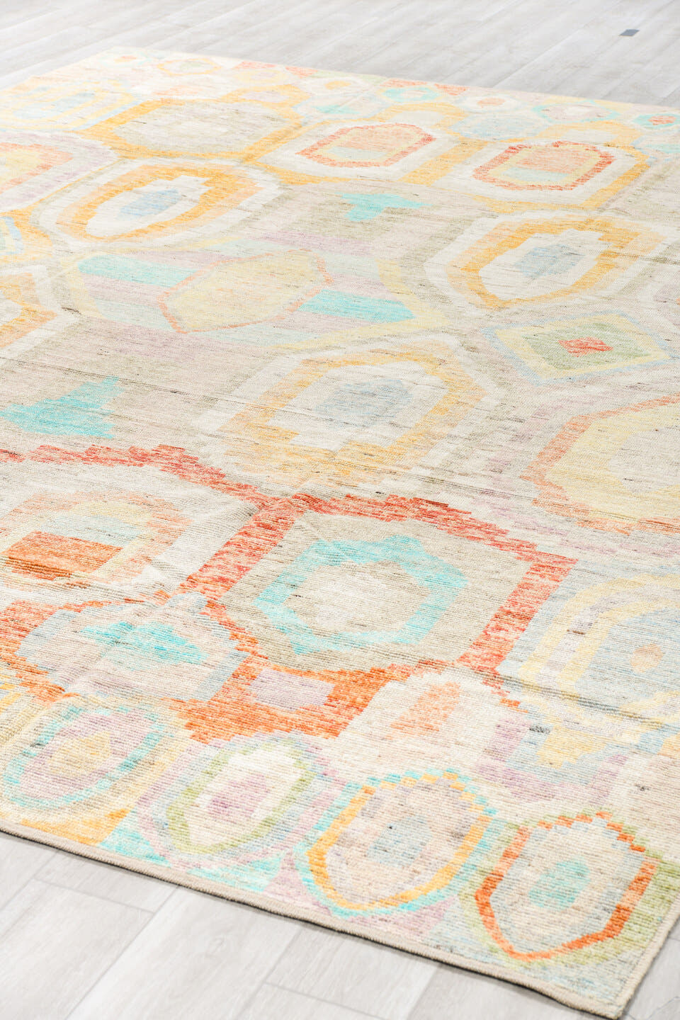 10' x 13' one-of-a-kind handmade vintage Tulu large size rug. Color palette: ivory, aqua, pale yellow, rust, lavender, taupe