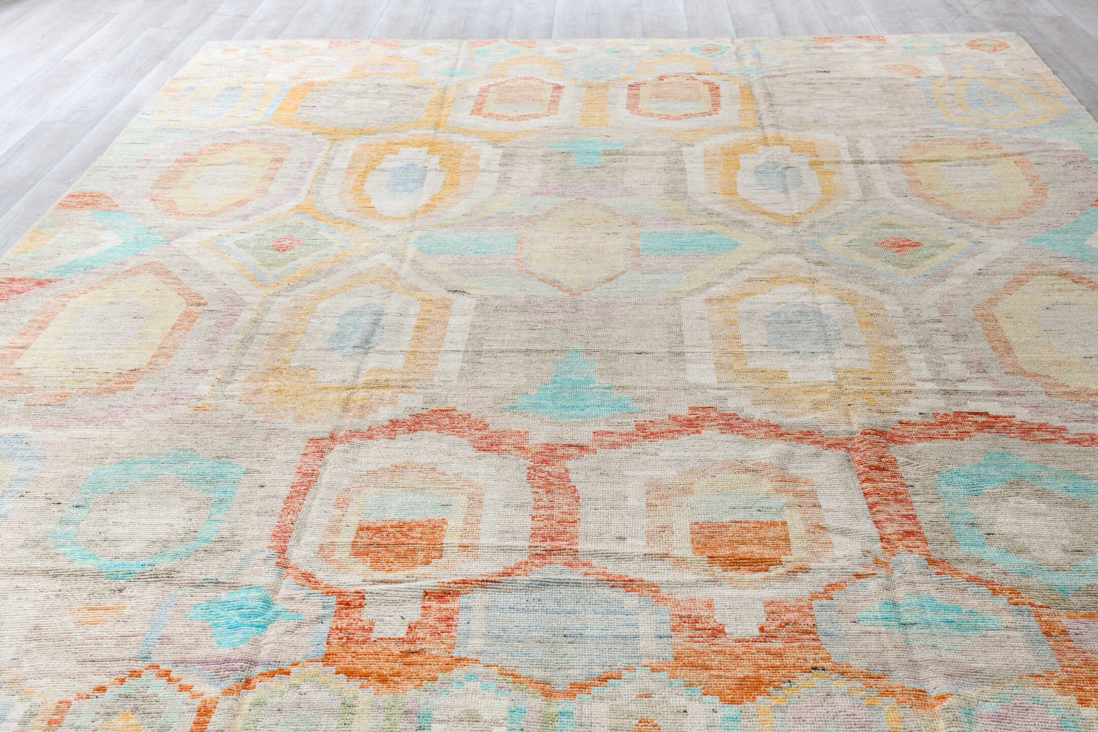 10' x 13' one-of-a-kind handmade vintage Tulu large size rug. Color palette: ivory, aqua, pale yellow, rust, lavender, taupe