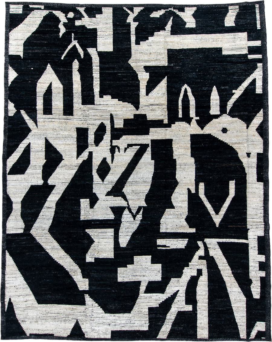 11' x 14' one-of-a-kind handmade vintage Tulu oversize rug. Color palette: black, ivory