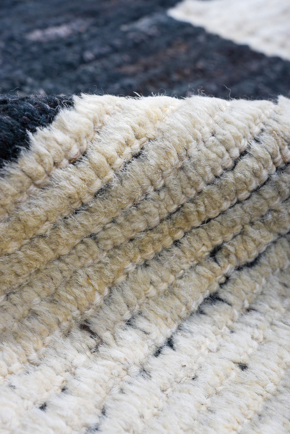 11' x 14' one-of-a-kind handmade vintage Tulu oversize rug. Color palette: black, ivory